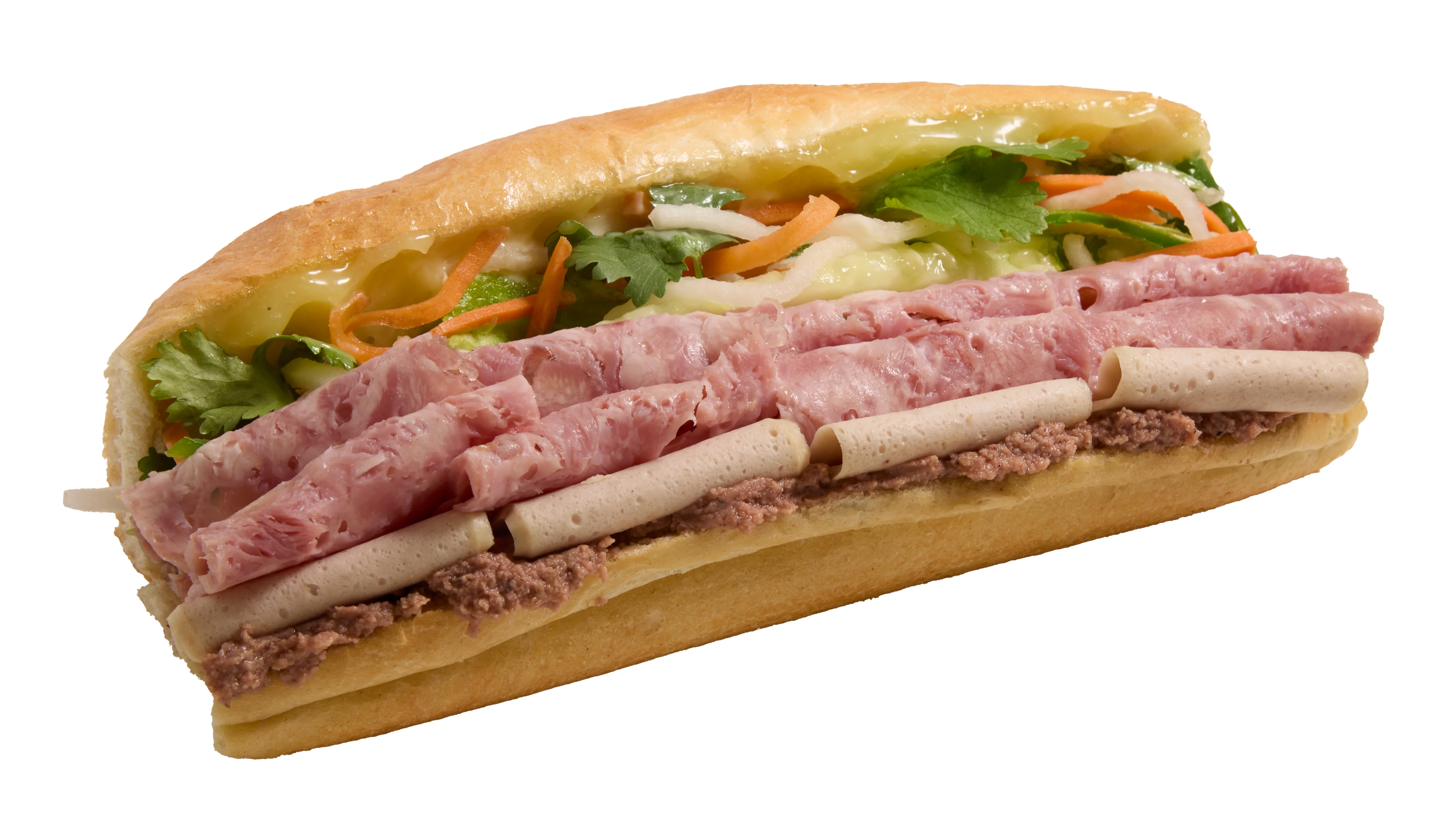 A beautifully arranged platter of cold cuts and garnishes.