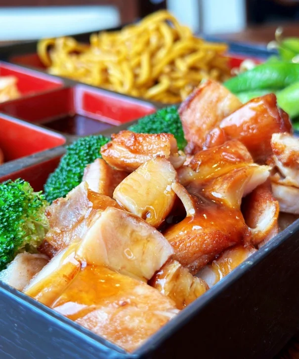 Chinese barbecue pork with broccoli and noodles