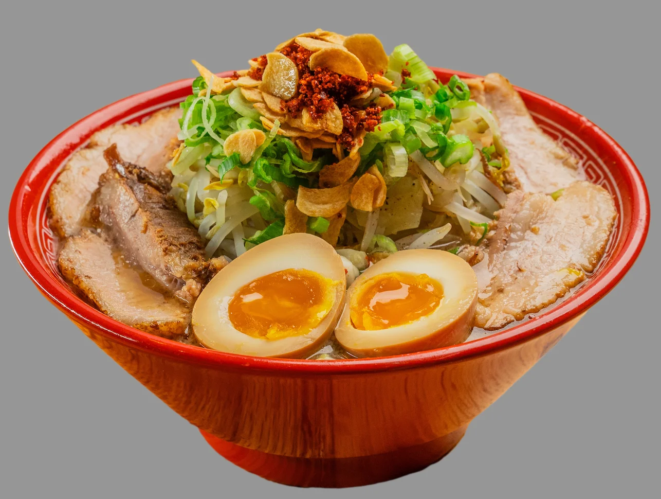 Japanese tonkotsu ramen with soft-boiled eggs and green onions