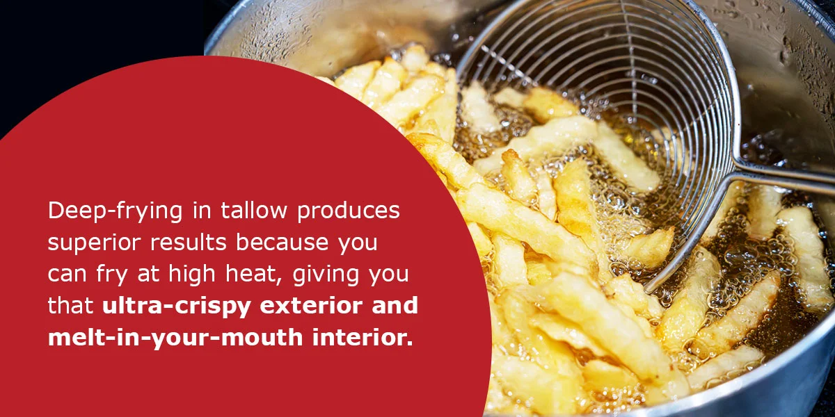 Golden French fries being deep-fried in tallow