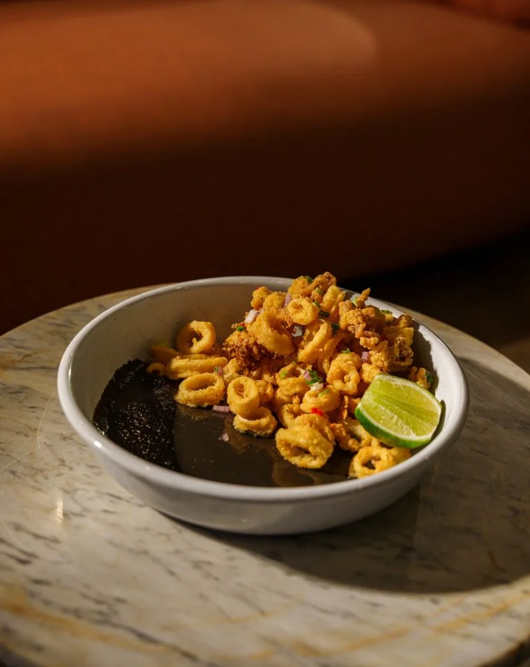 Crispy calamari, Adobo sauce, fried pickled long peppers.