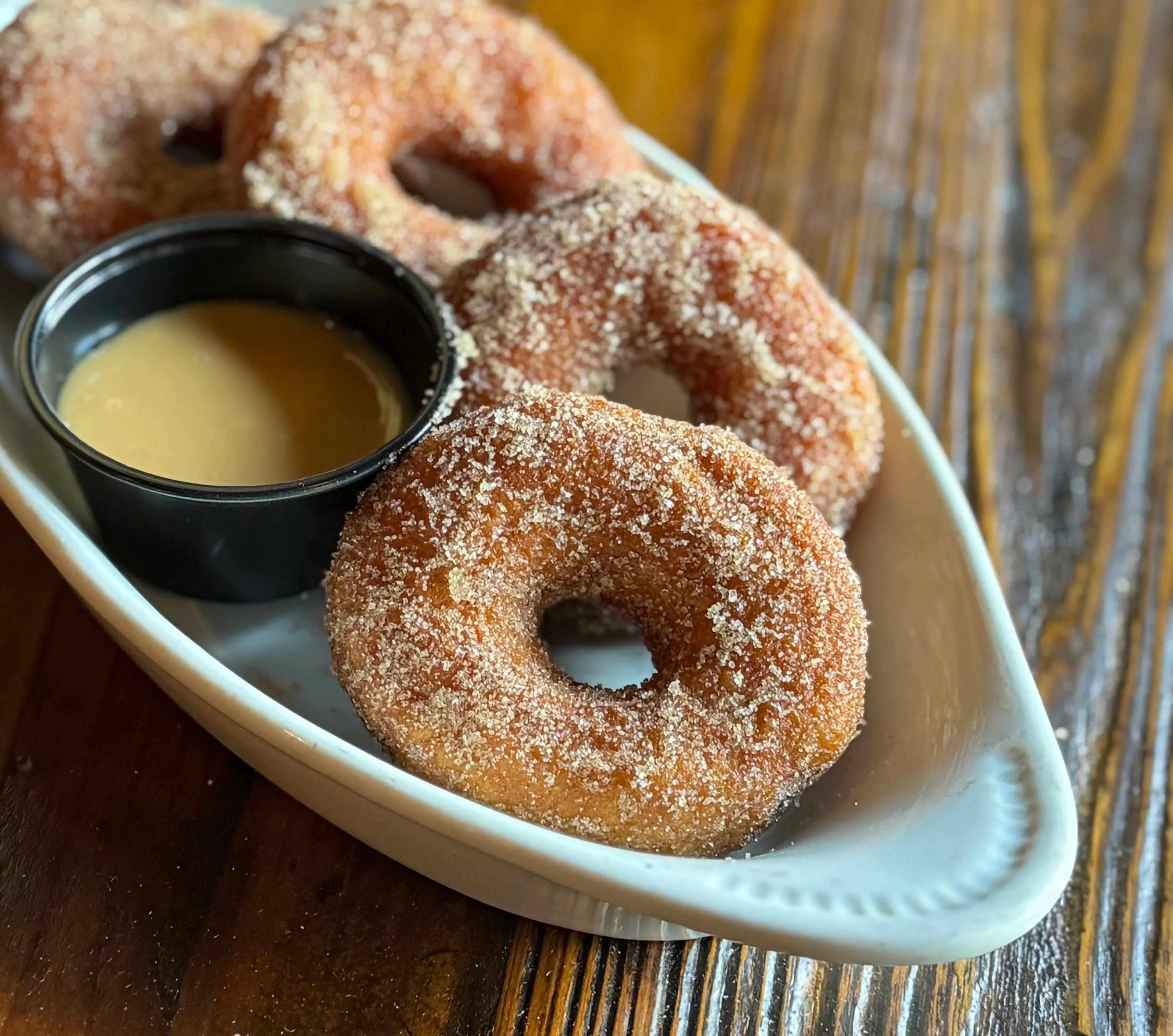 Cinnamon sugar donuts with caramel dipping sauce