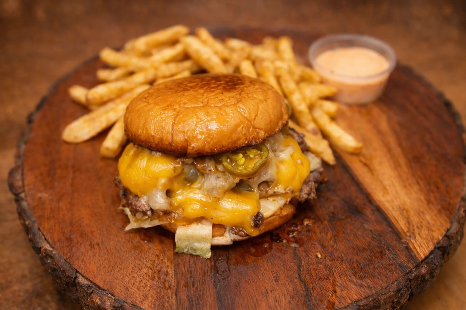 Juicy cheeseburger with fries, a classic American comfort food
