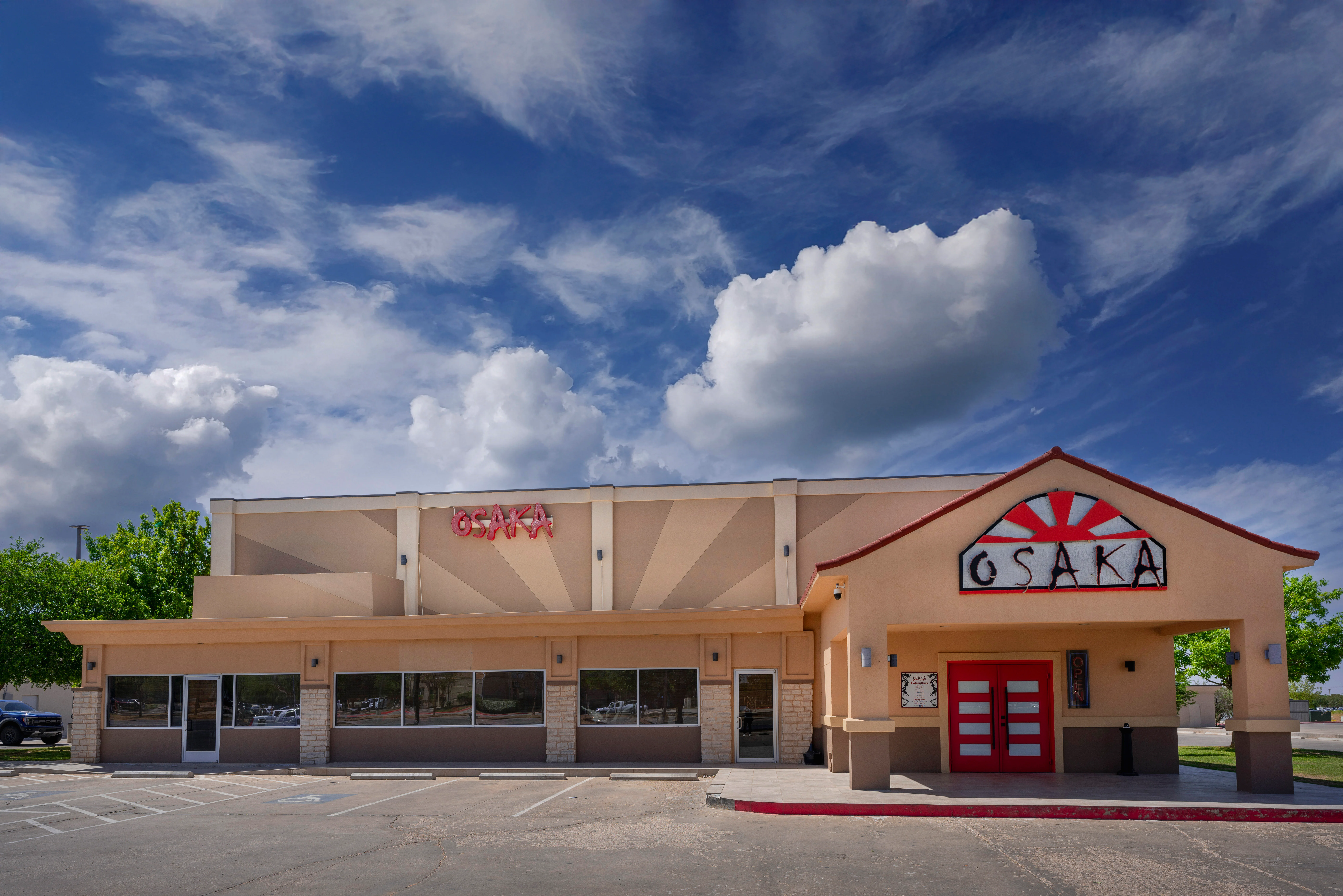 Exterior view of Osaka Japanese restaurant with vibrant signage
