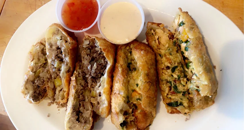 Crispy Filipino lumpia with dipping sauces