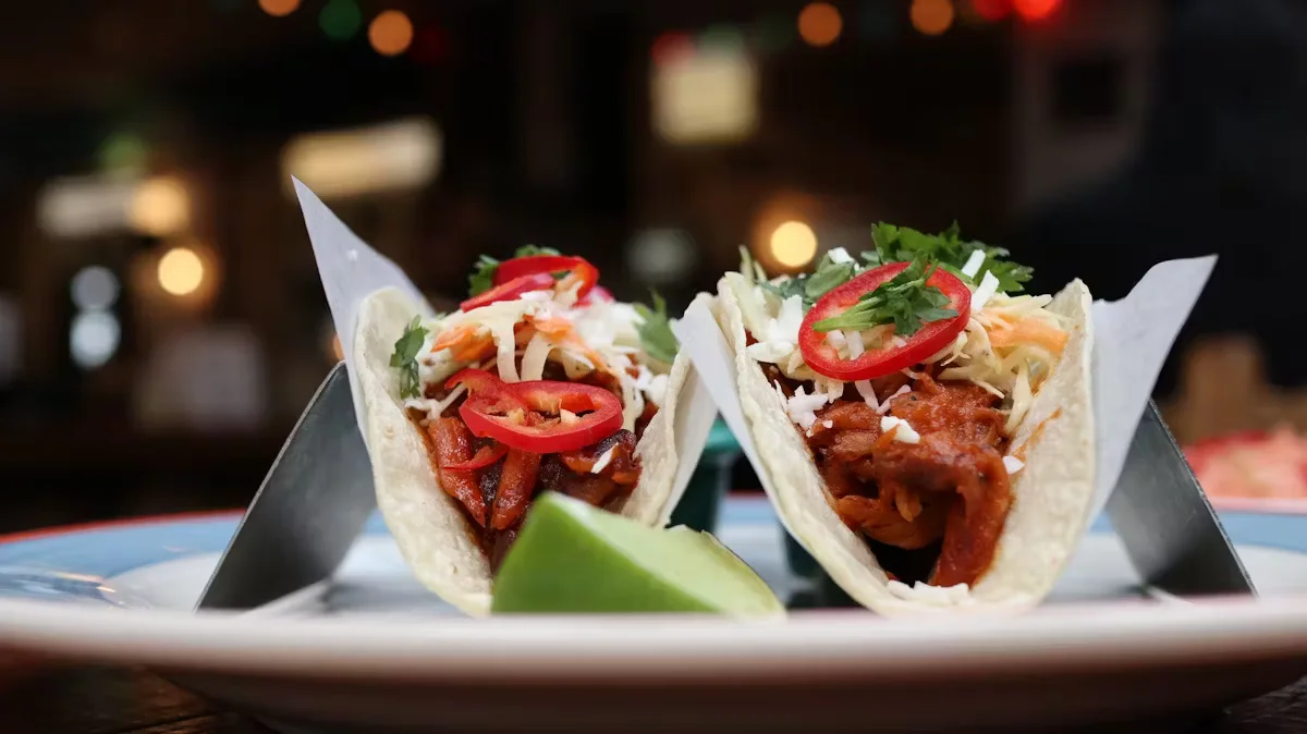 two tacos with lime