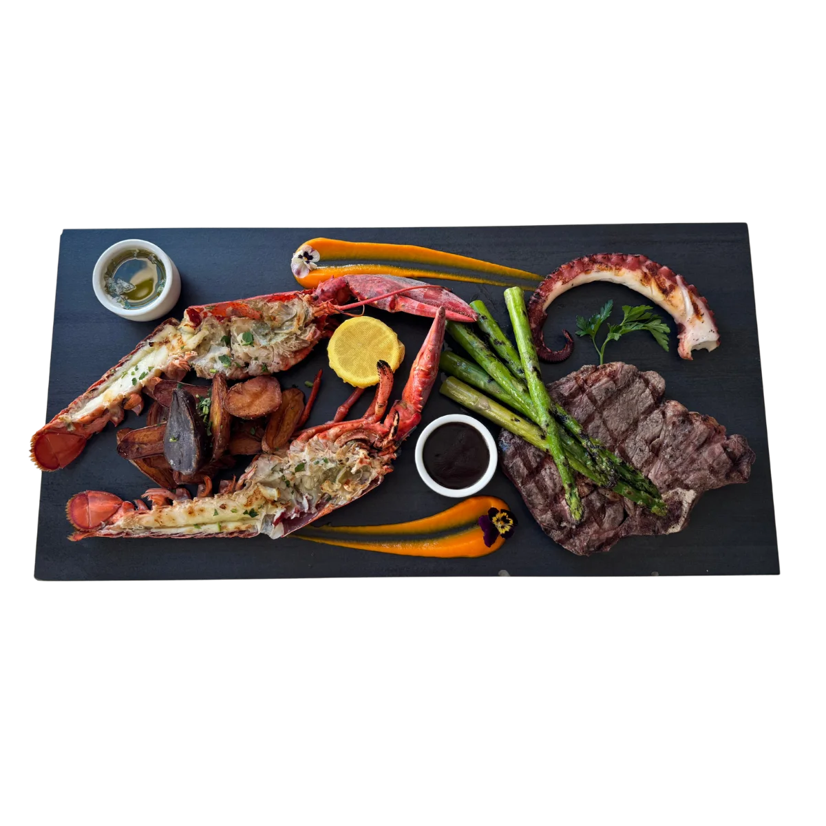Grilled seafood platter with lobster and steak