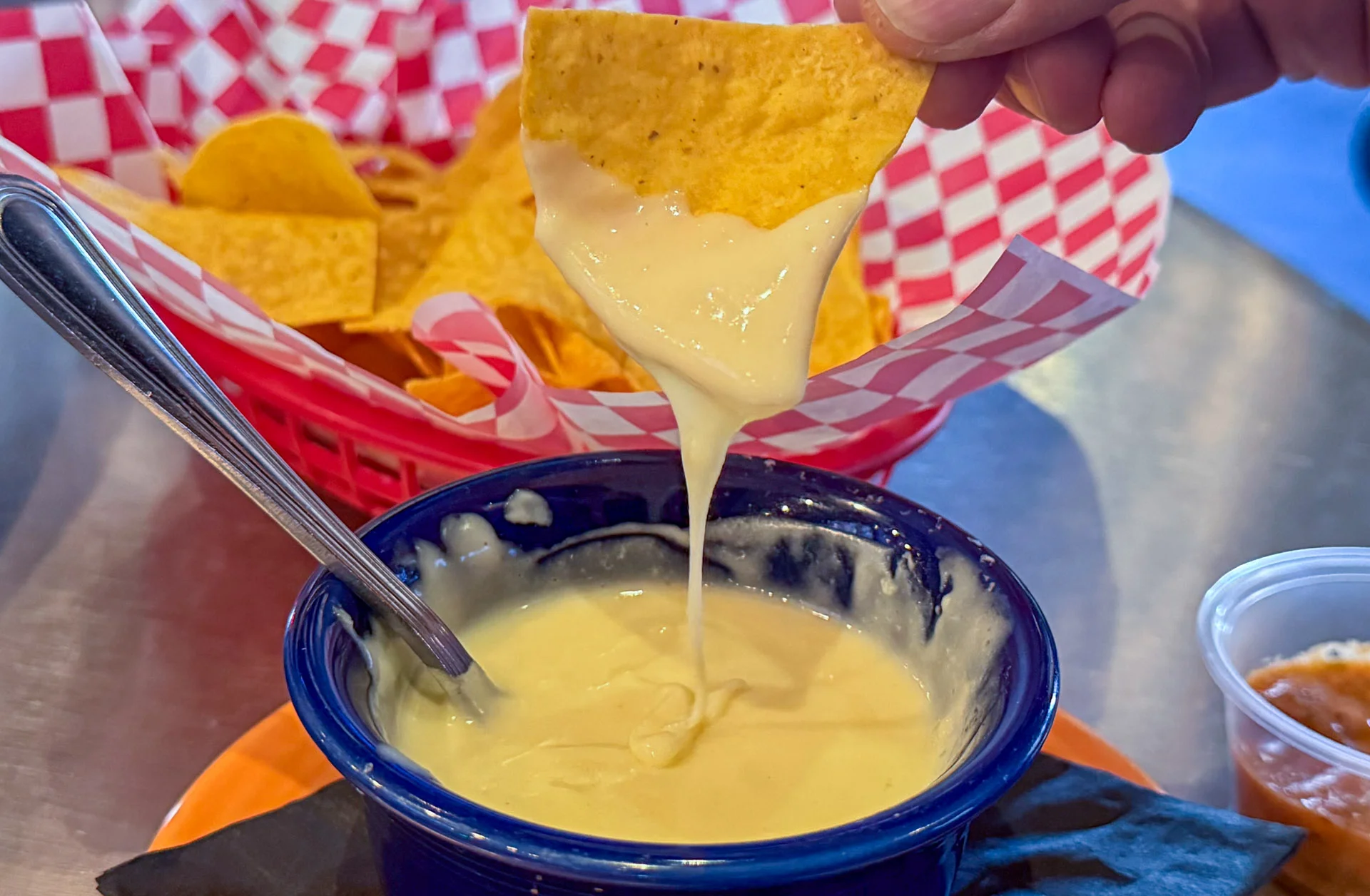Queso Dip is cheese, milk, garlic, onion, cumin, jalapeno