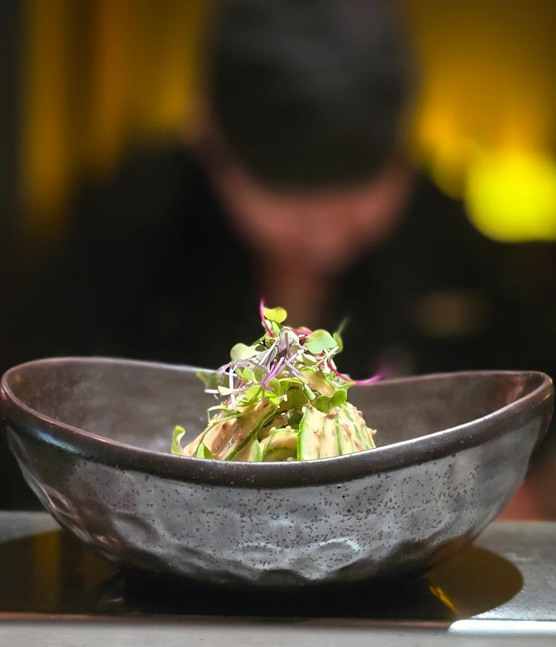 Artful avocado salad in a modern bowl