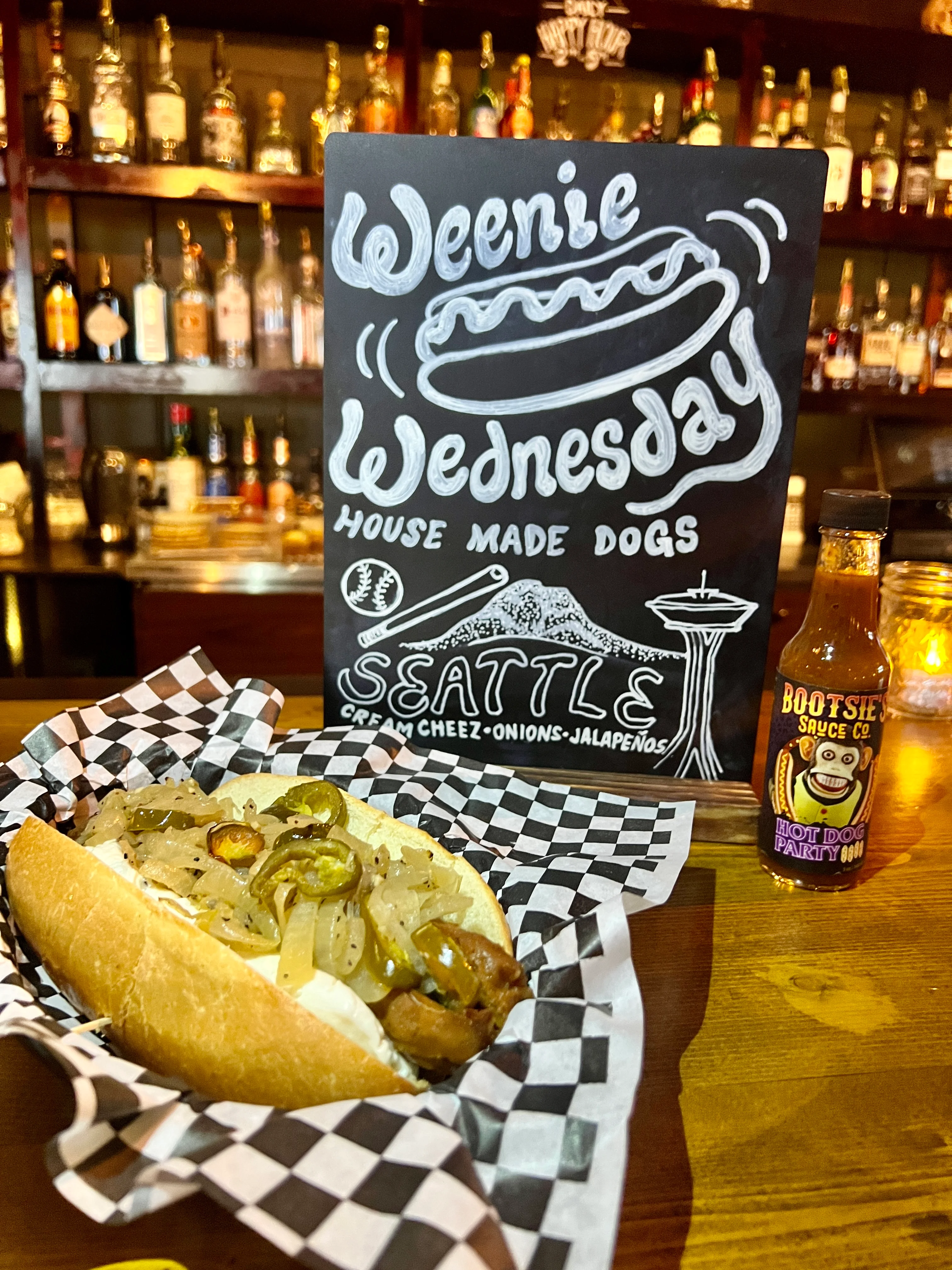 Seattle-style hot dog with cream cheese and jalapeños