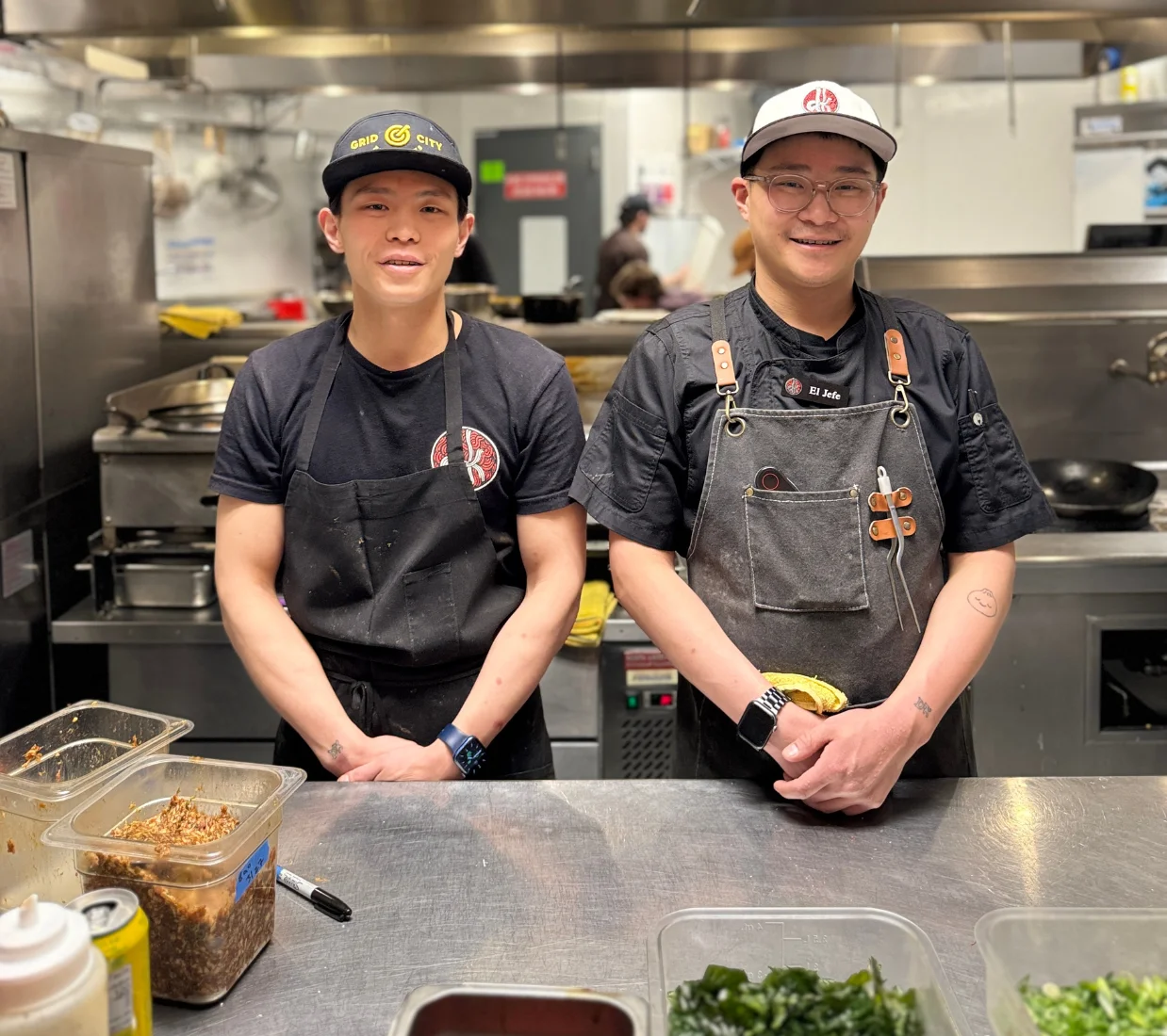 Owners Tim & Joe making Chinese food near Sugarhouse