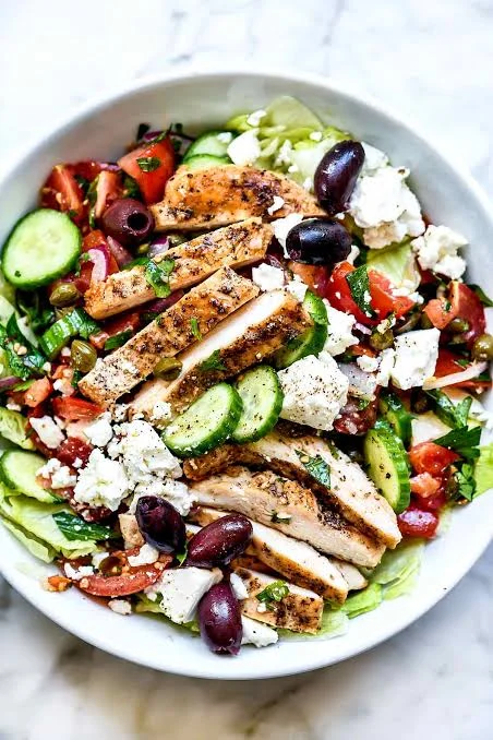 Grilled chicken Greek salad with feta and olives