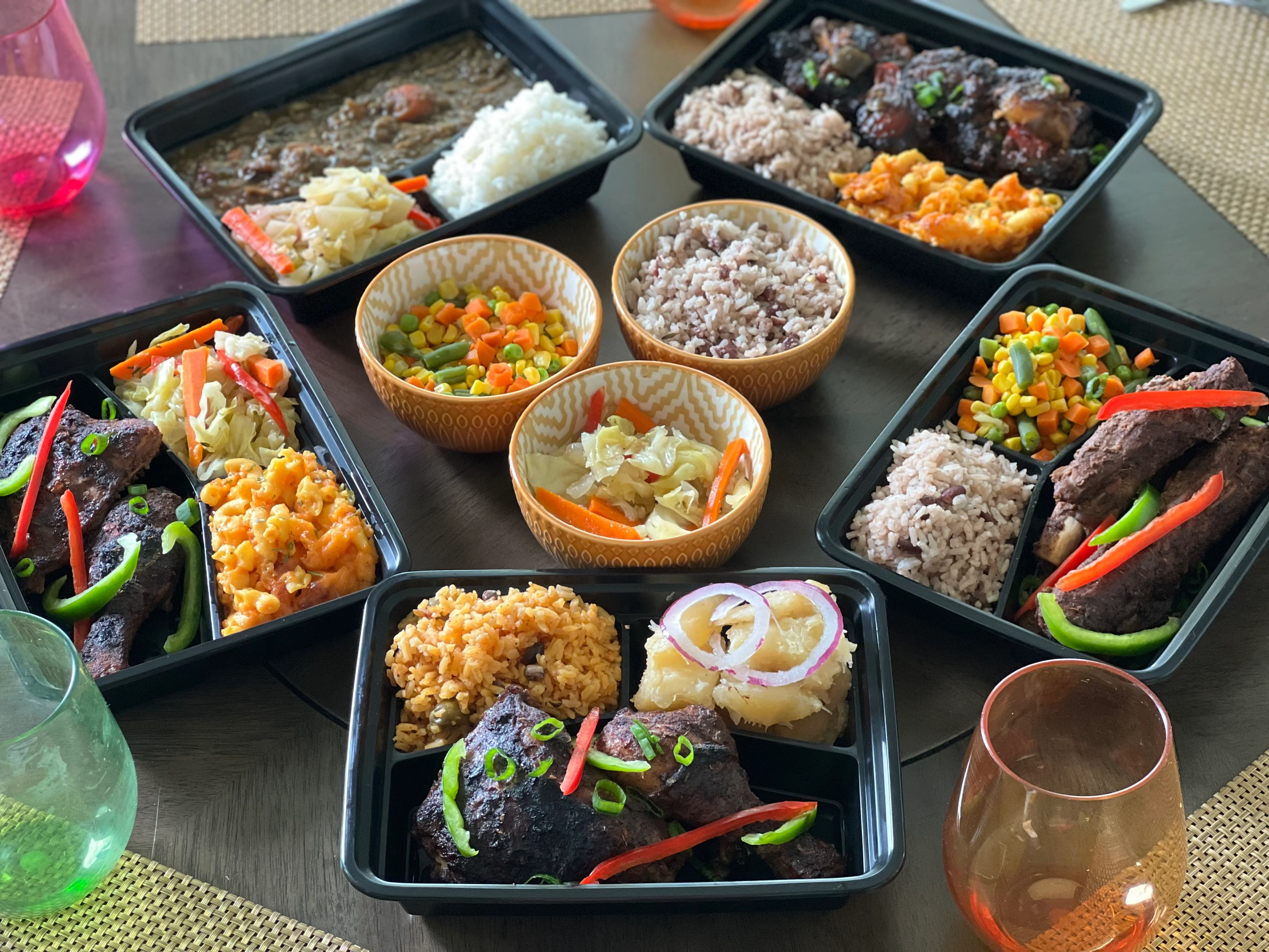 Caribbean jerk chicken meal with rice and vegetables