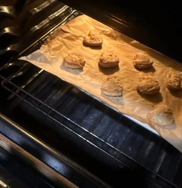 Freshly baked scones cooling in the oven