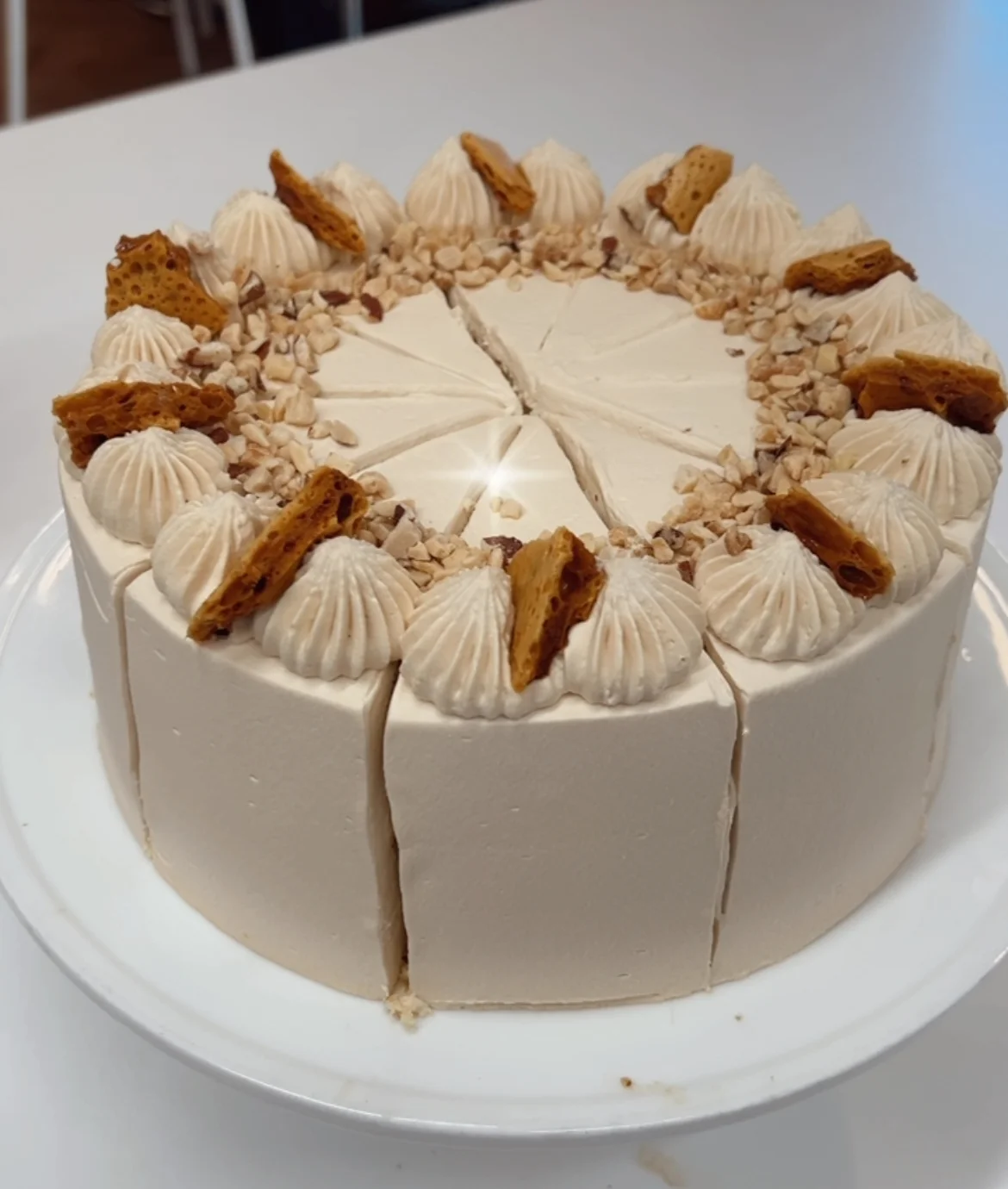 Decadent honeycomb cake with creamy frosting and crunchy toppings