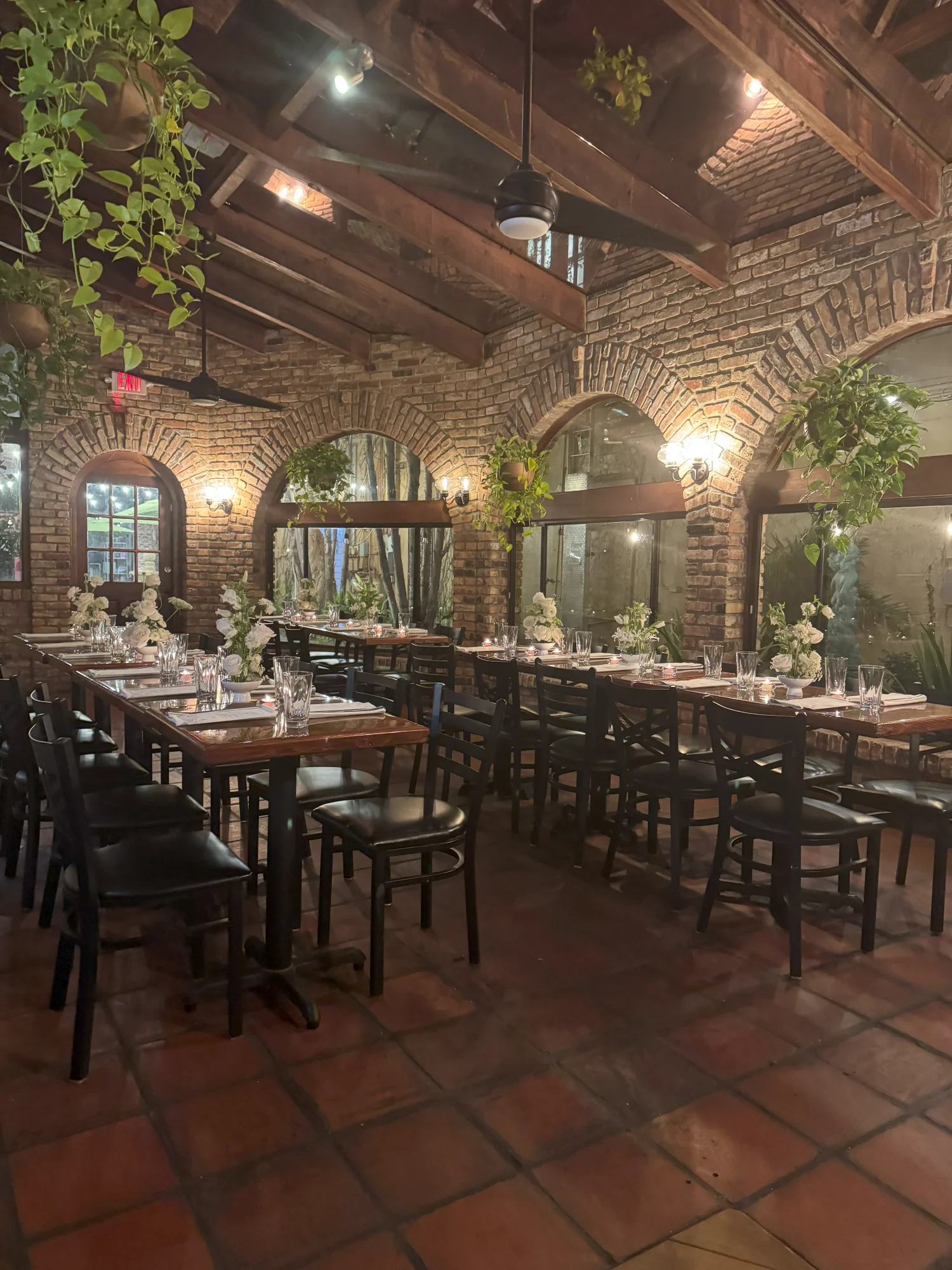 Cozy restaurant interior with exposed brick and wooden beams