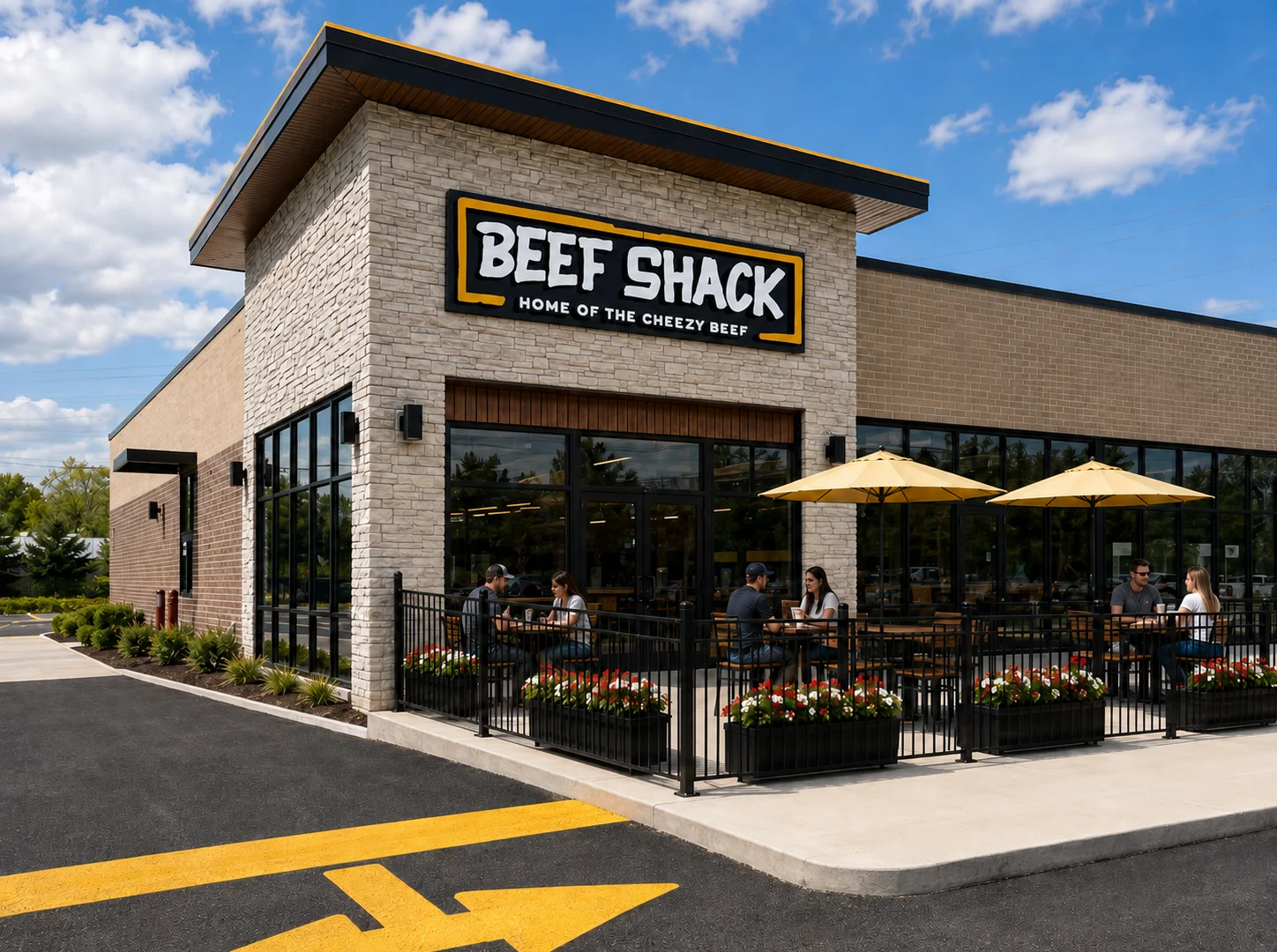 Modern restaurant exterior with outdoor seating and umbrellas