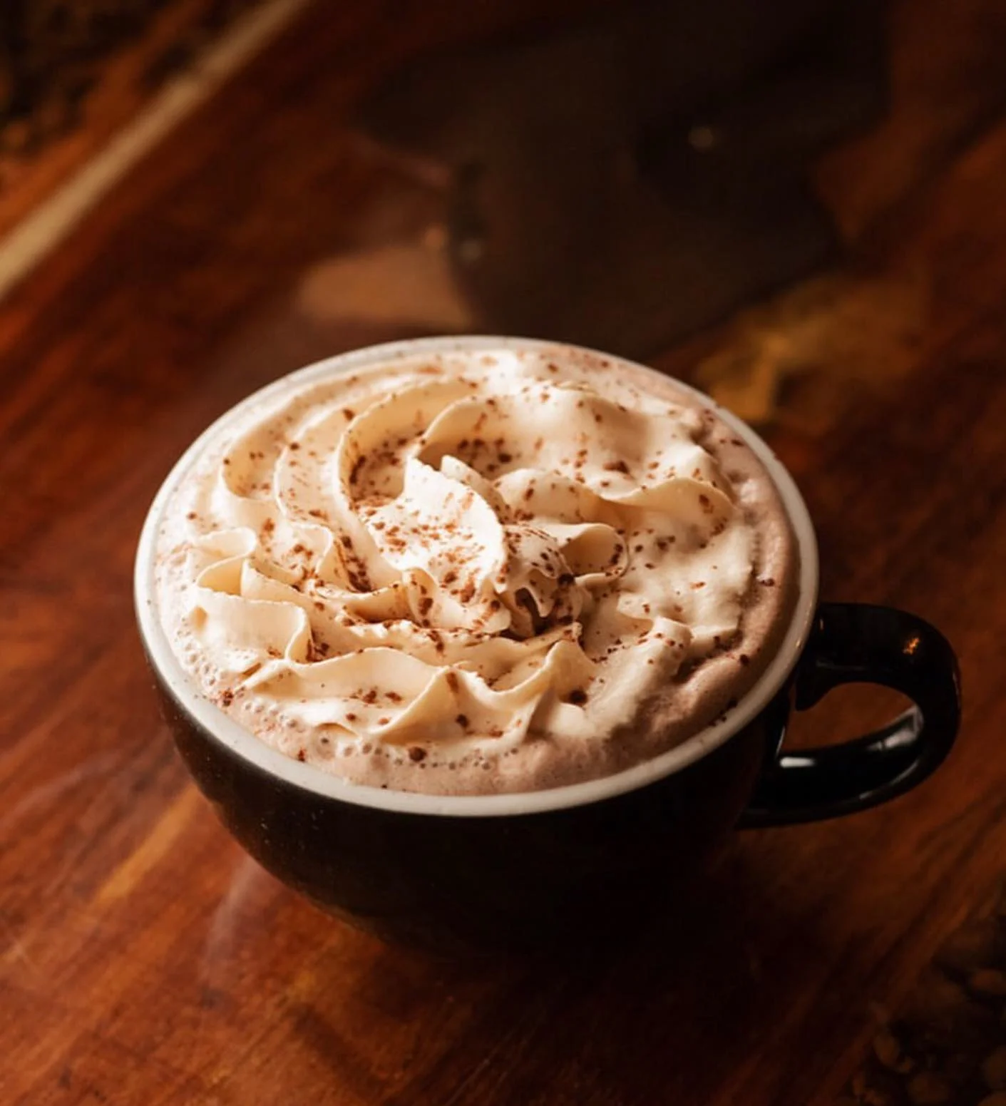 Rich hot chocolate topped with whipped cream