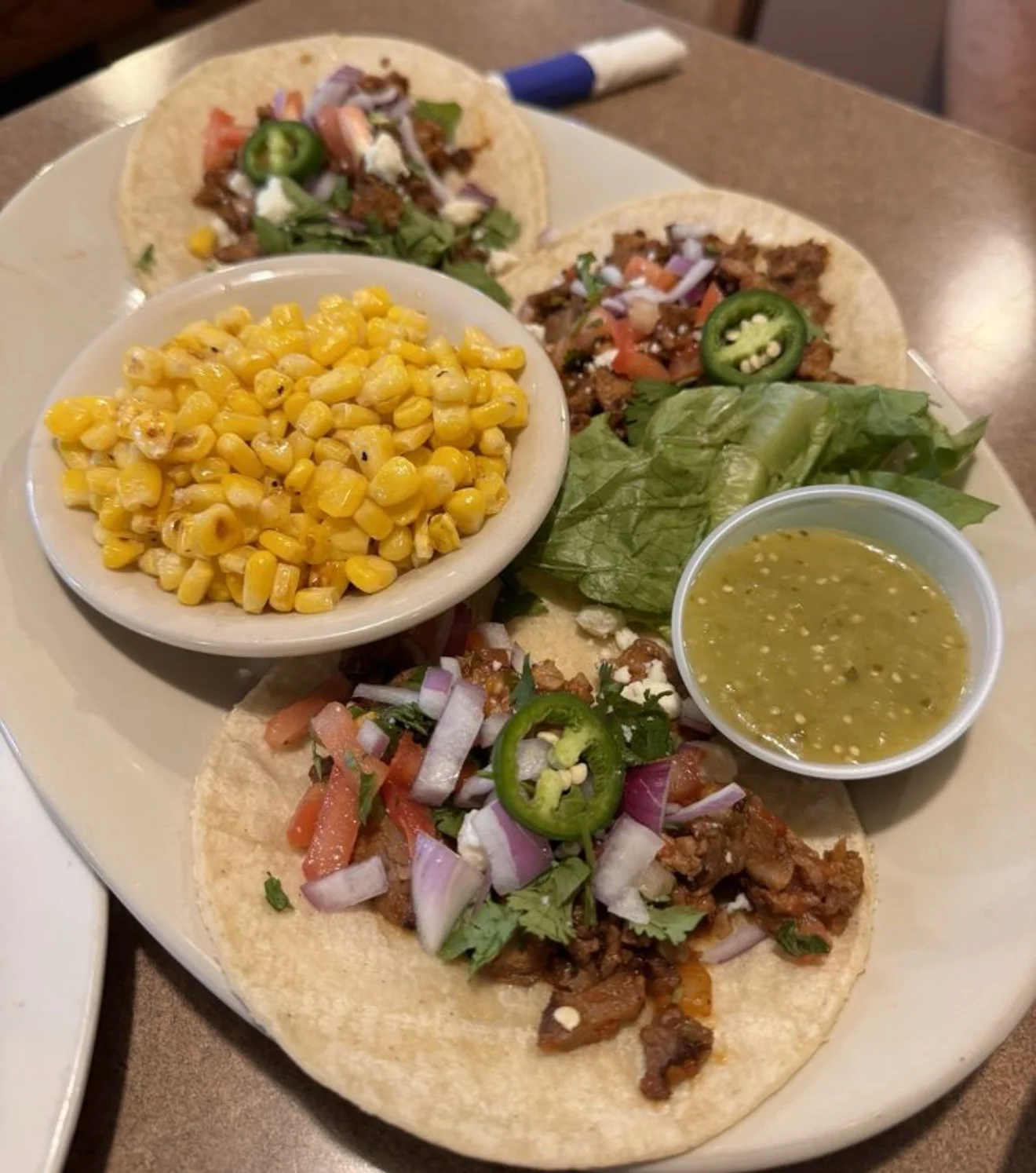 A detailed menu from Tito's Cantina featuring a variety of drinks, starters, nachos, soups, and tacos.