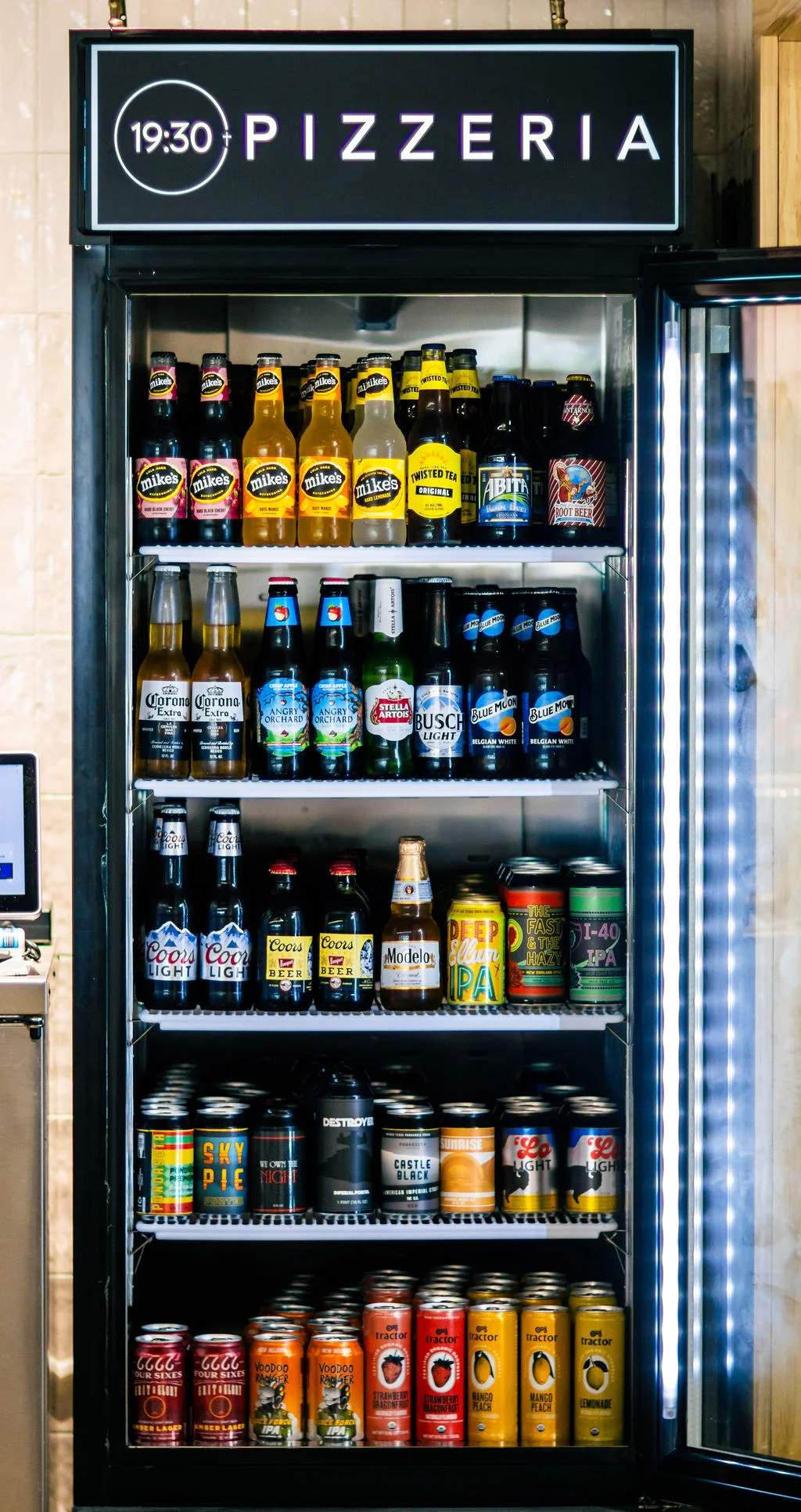 Chilled beverage display at a pizzeria