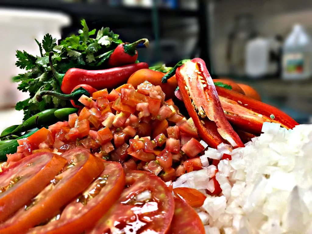 Fresh salsa ingredients for Mexican cuisine preparation