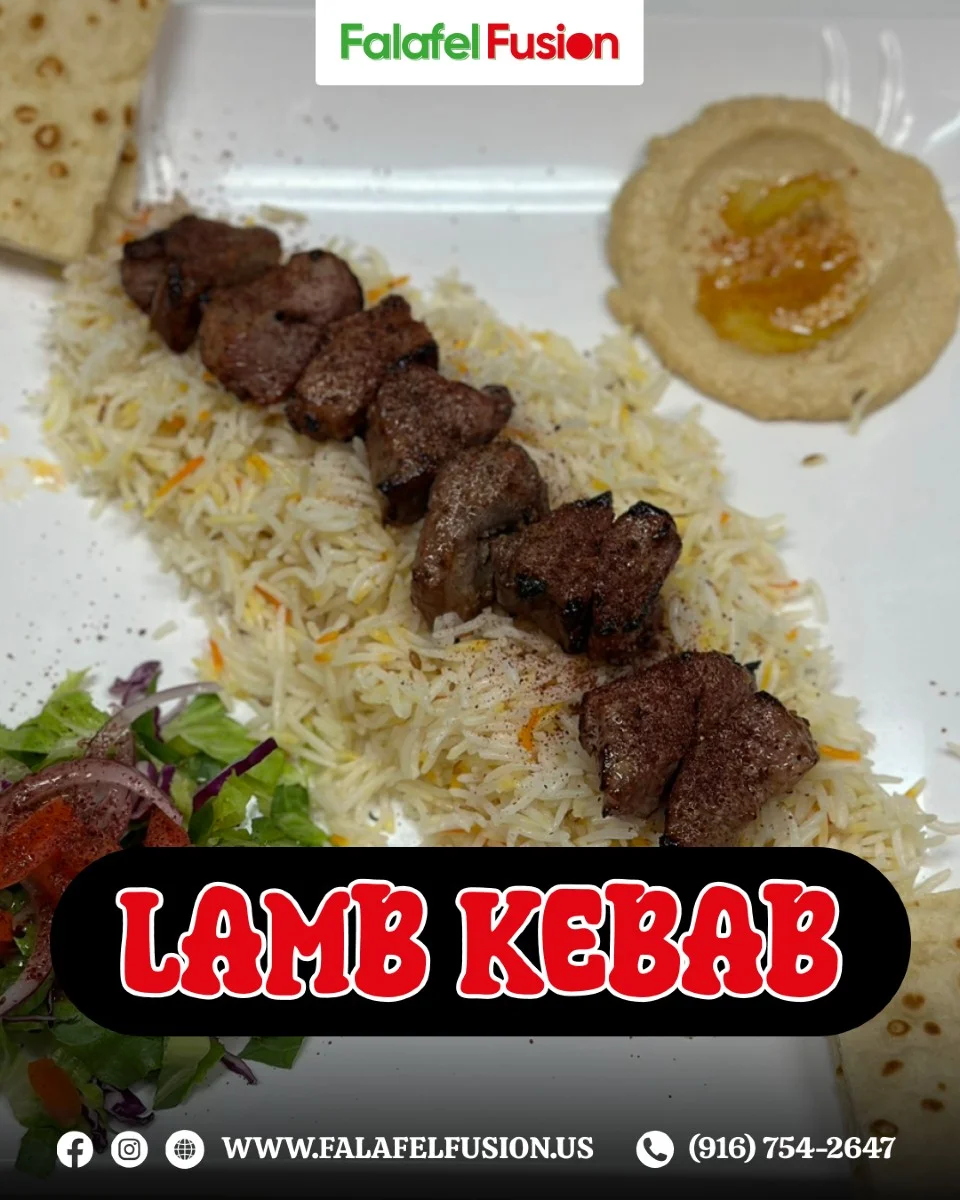 Grilled lamb kebab served on fragrant rice