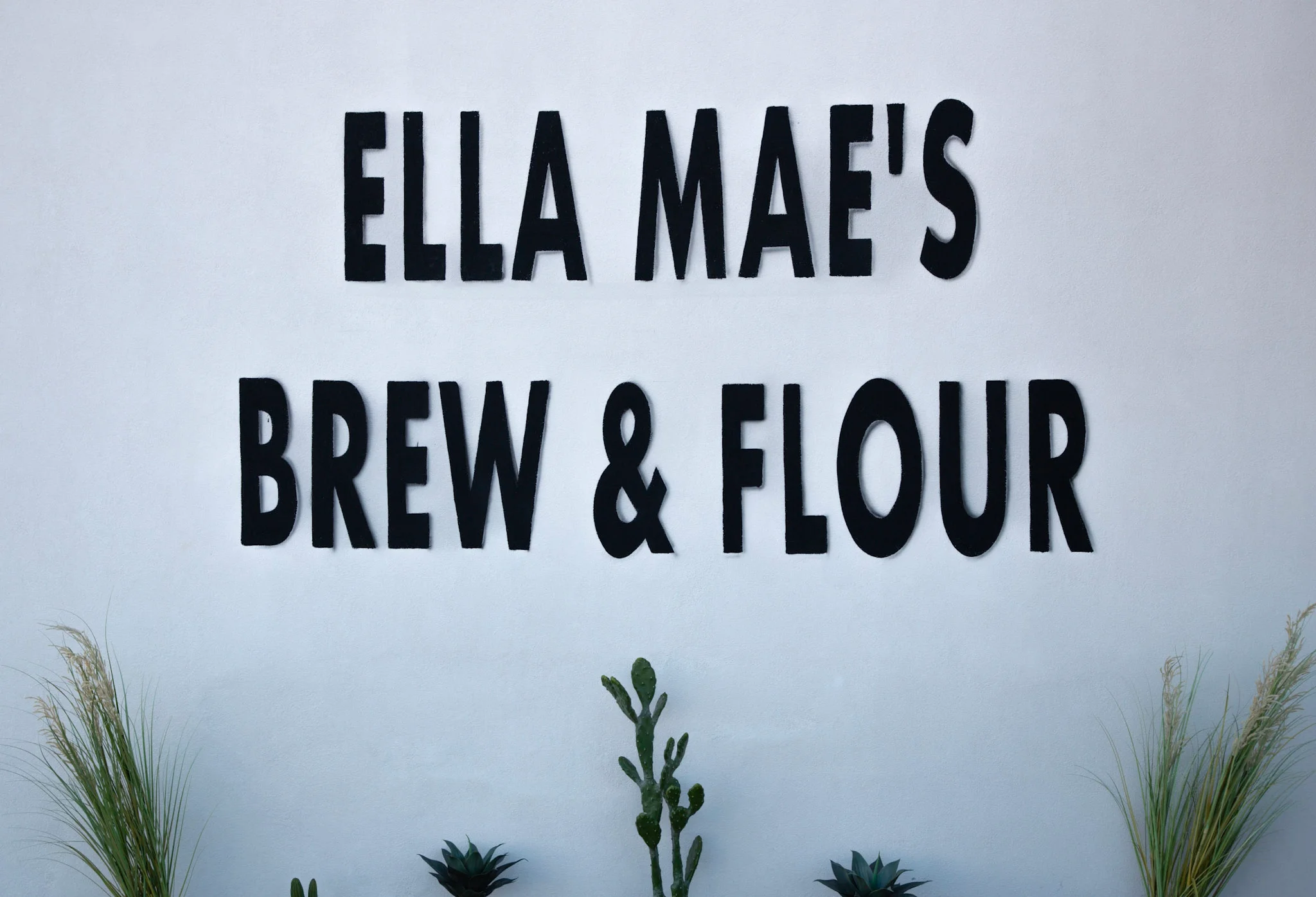Signage for Ella Mae's Brew & Flour cafe