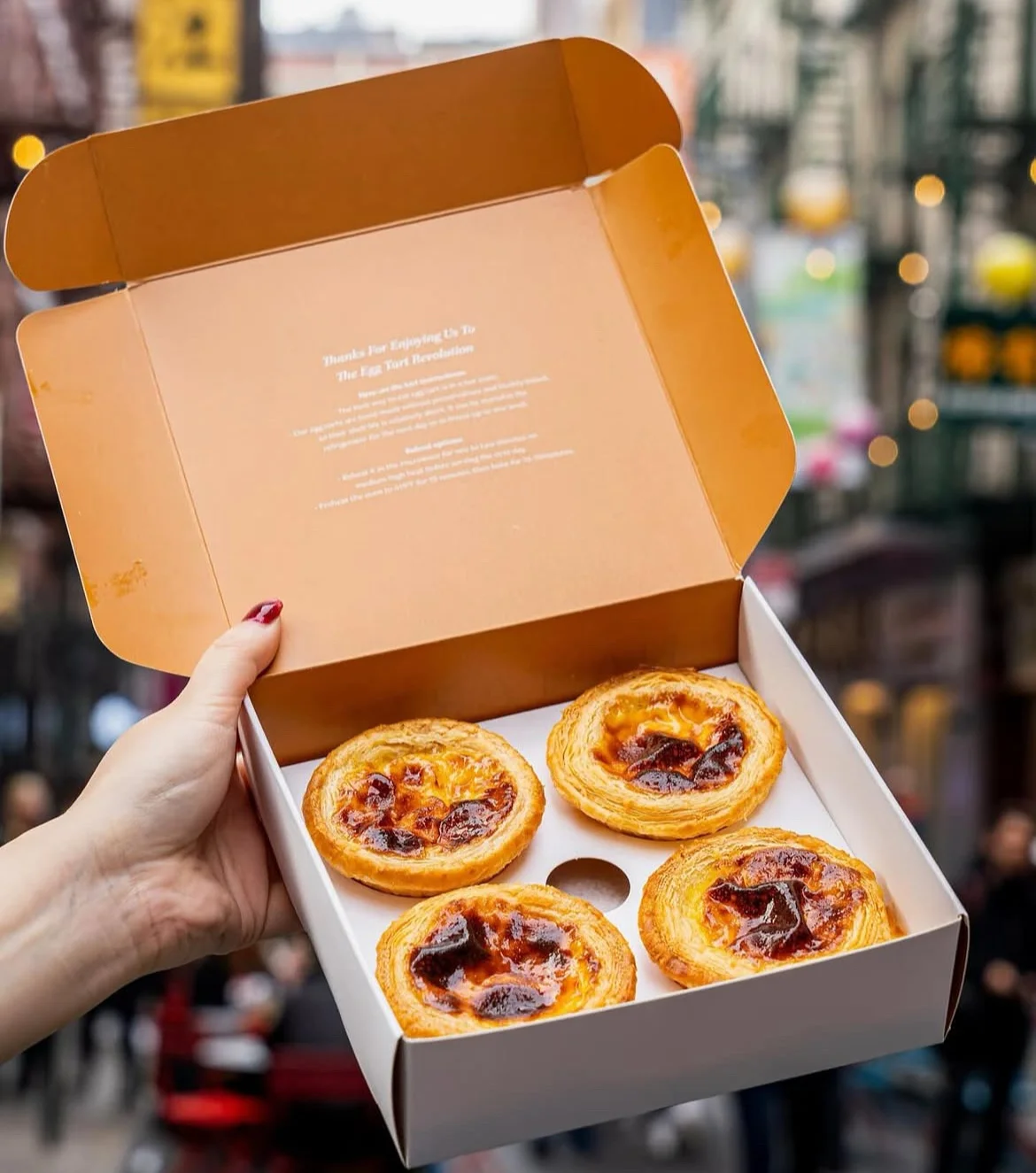 Box of Hong Kong egg tarts ready to enjoy