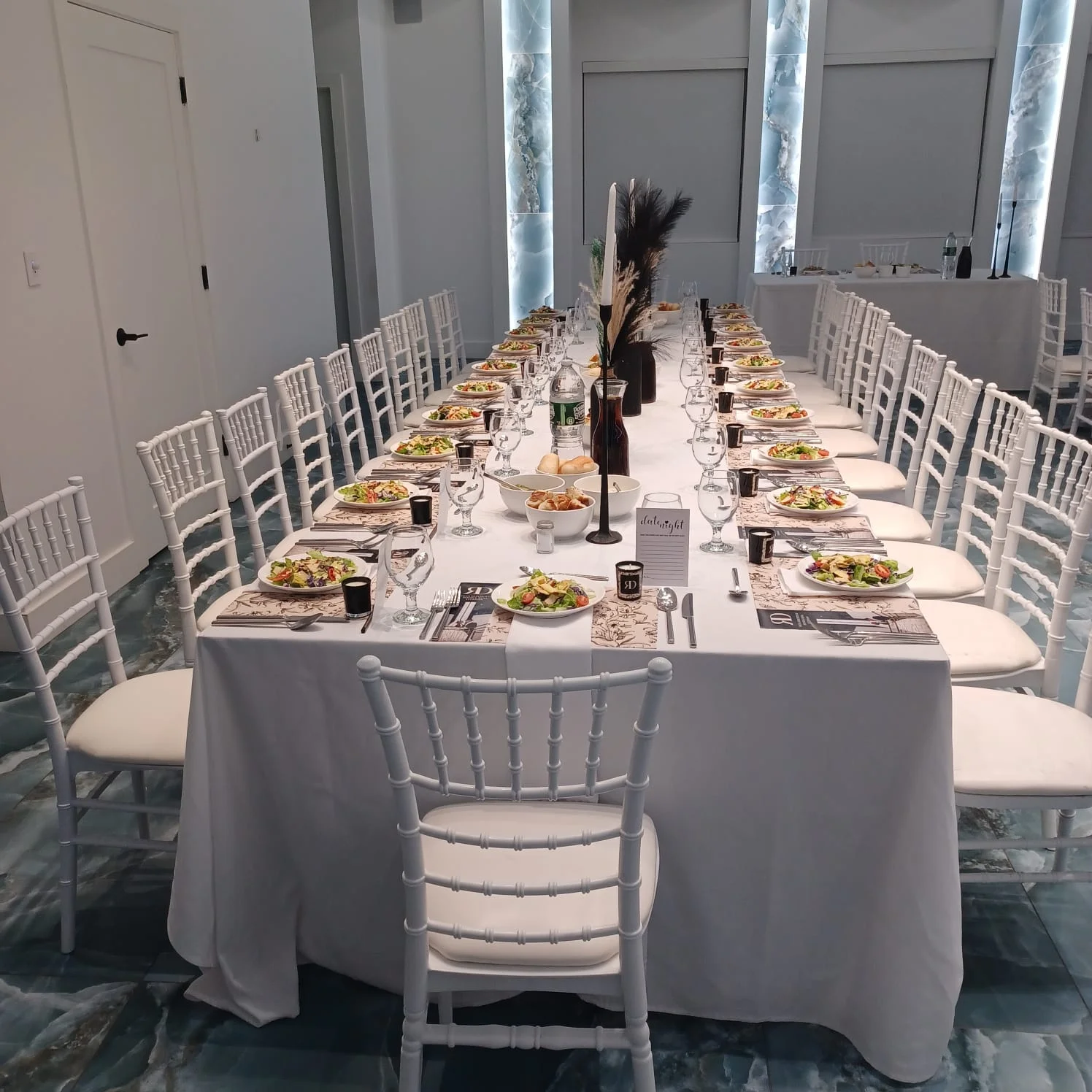 Elegant dining setup with salads and fine tableware