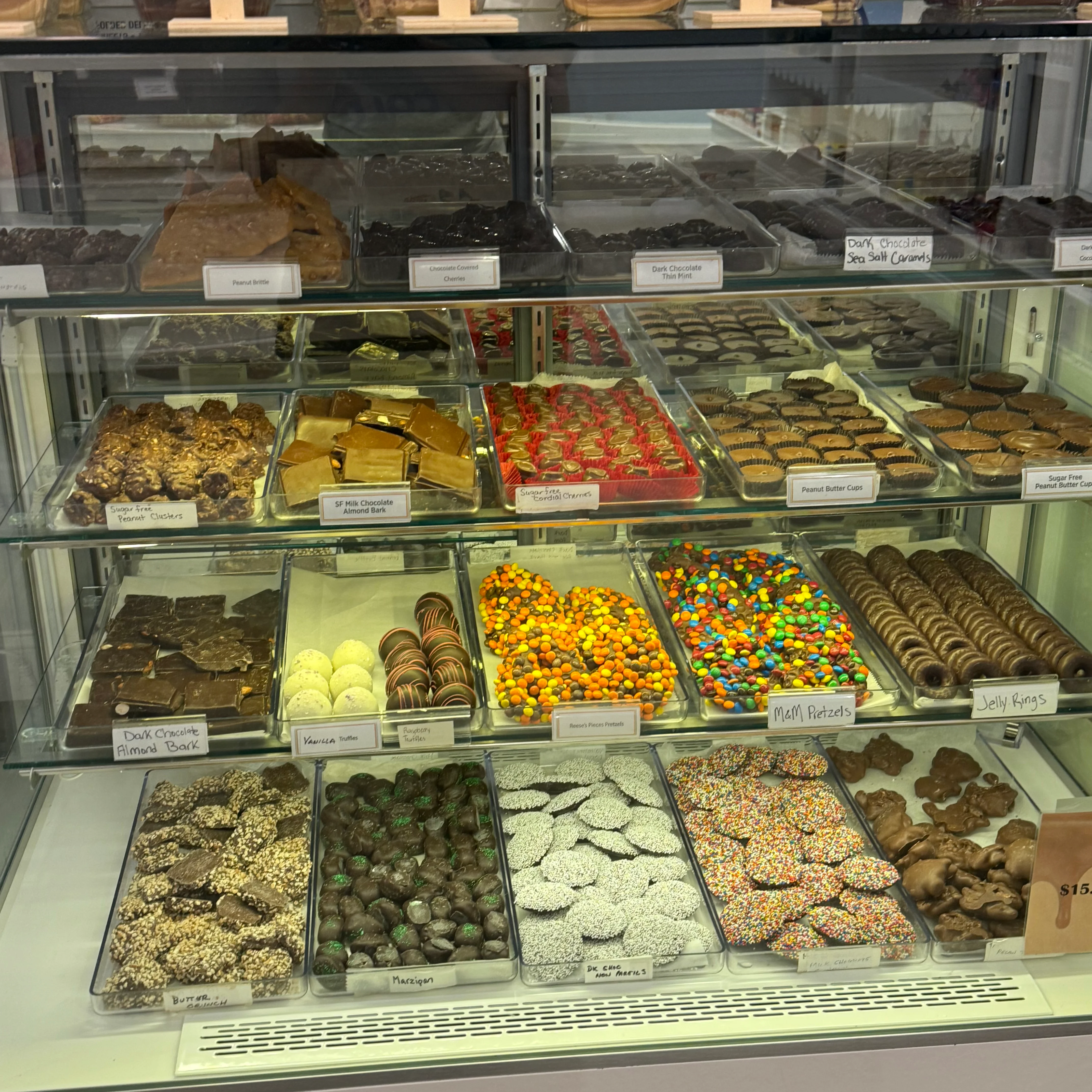 Assorted chocolates and confections in a display case