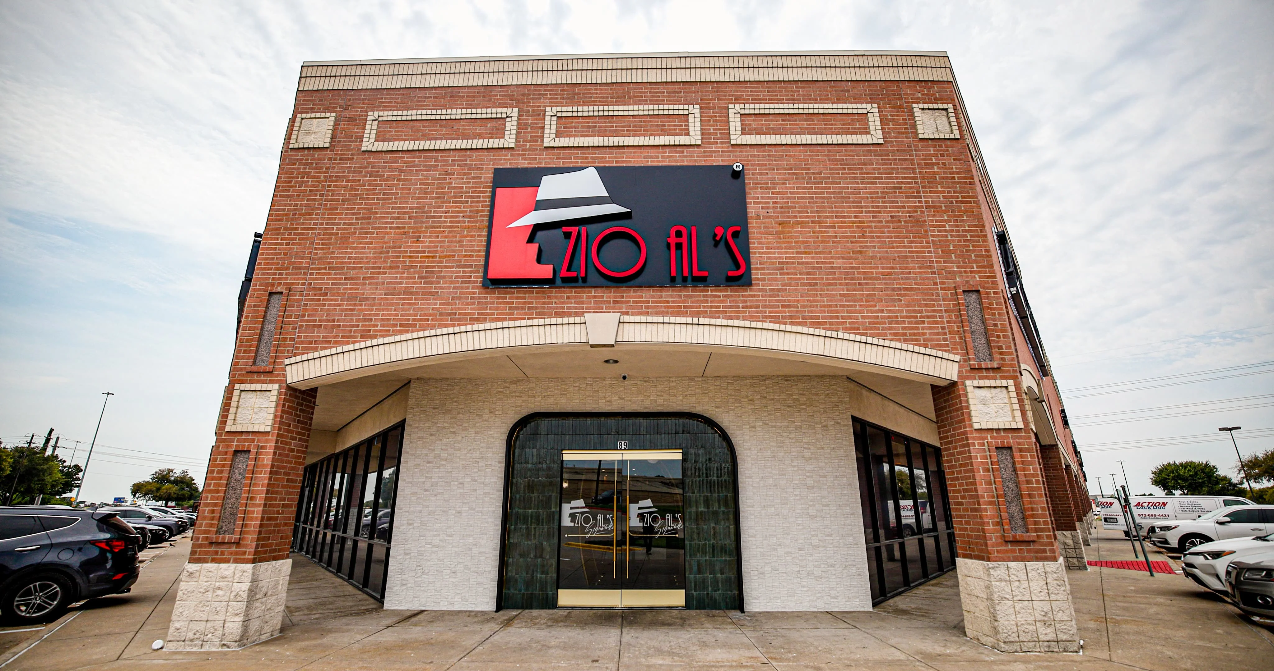 Exterior view of Zio Al's restaurant with modern signage