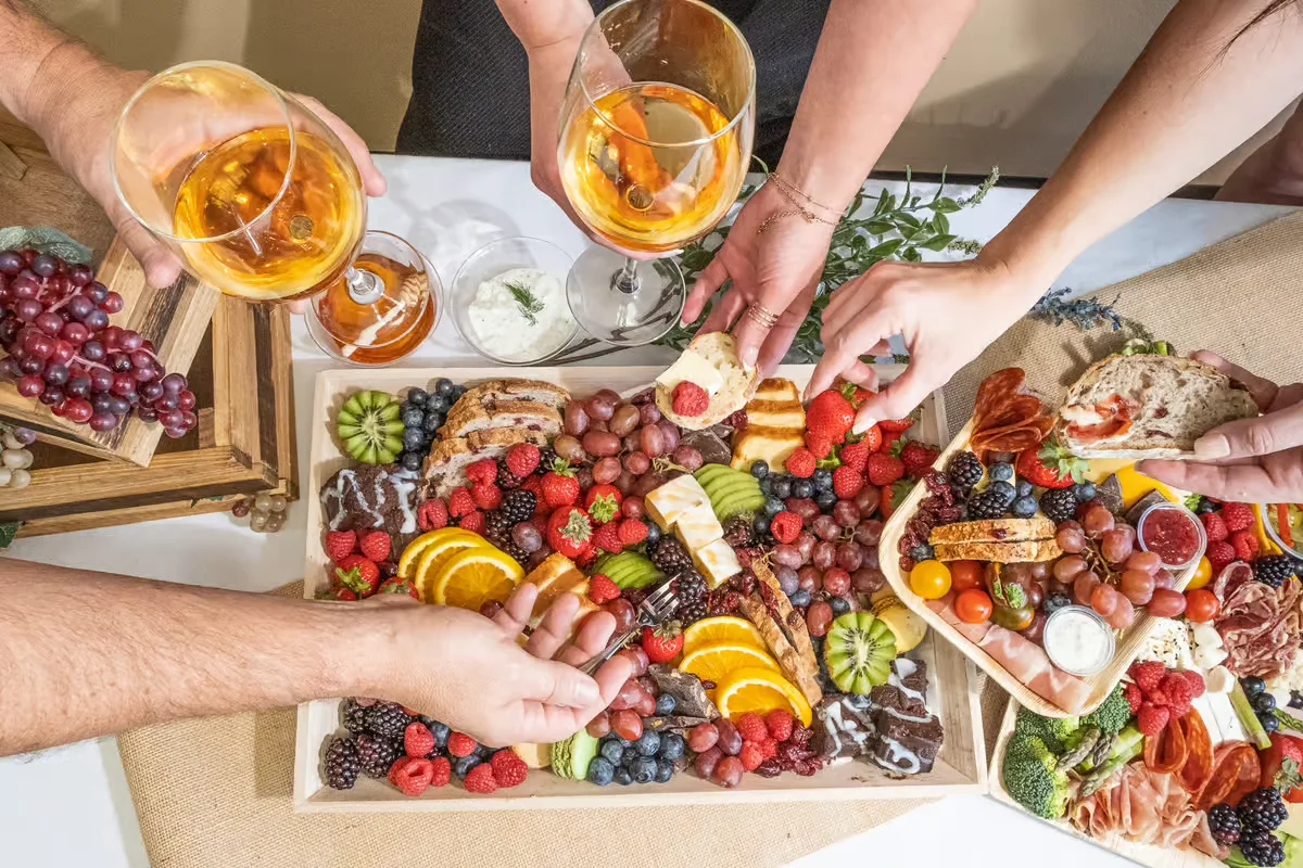 Colorful charcuterie board with fruits and cheeses