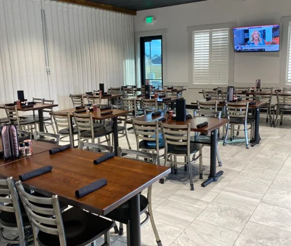 Modern restaurant interior with tables and chairs