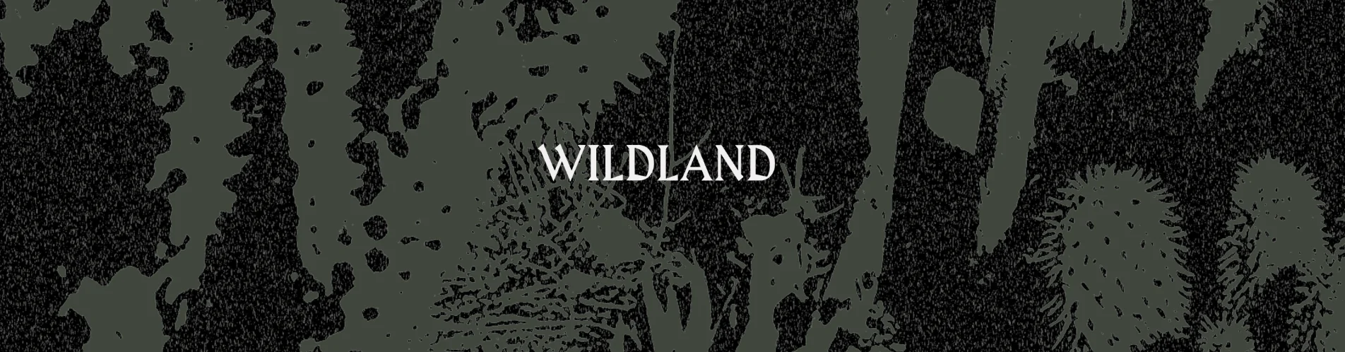 Stylized logo for Wildland restaurant with nature-inspired design