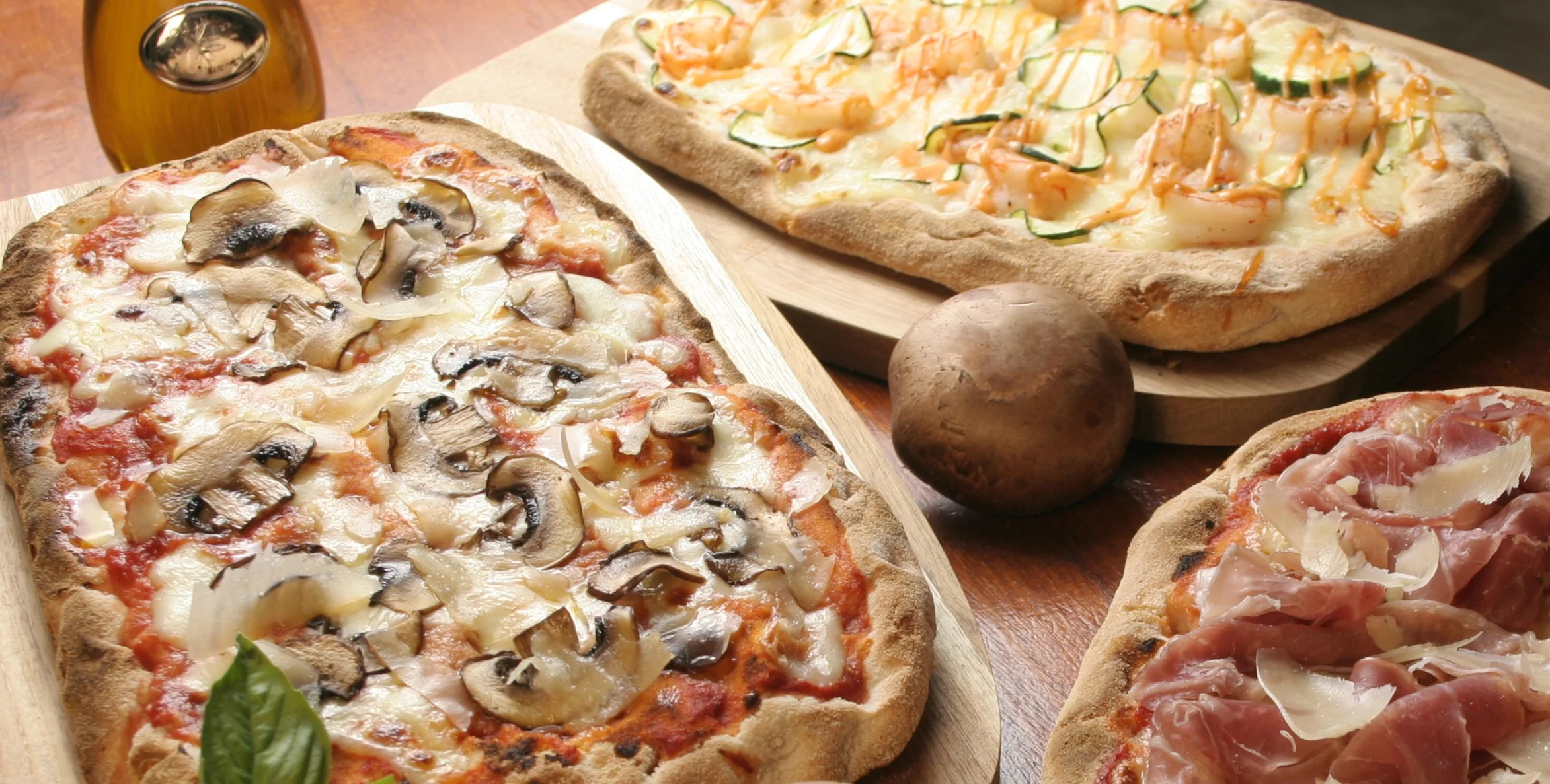 3 Italian Pinsa Romana, mushrooms, prosciutto and Gamberetti  
