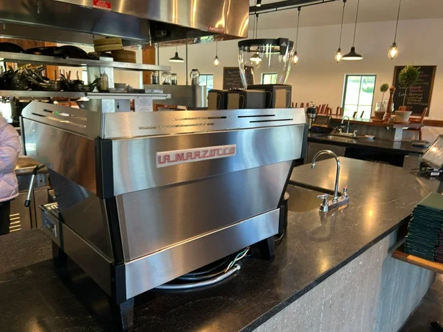Professional espresso machine in a modern café setting