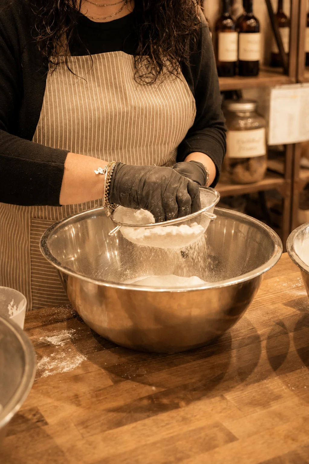 Artisan crafting a handcrafted bath product at Magnolia Ritual, a Texas apothecary in Magnolia, Texas.