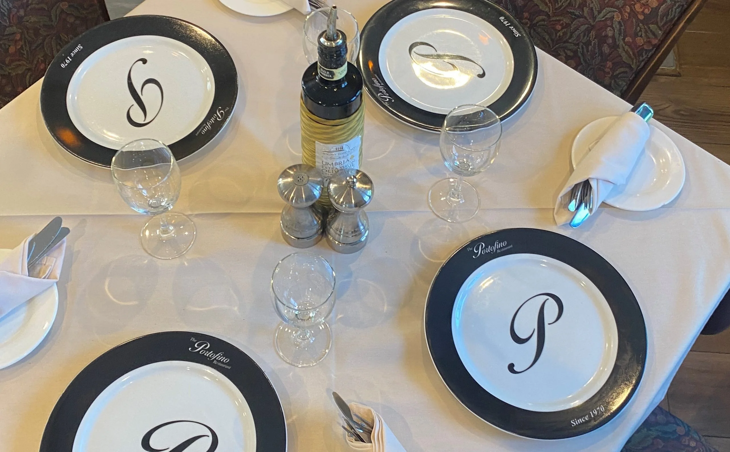 Elegant restaurant table setting with personalized plates