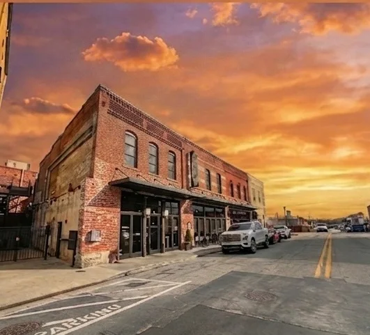 Historic brick building at sunset in a charming street