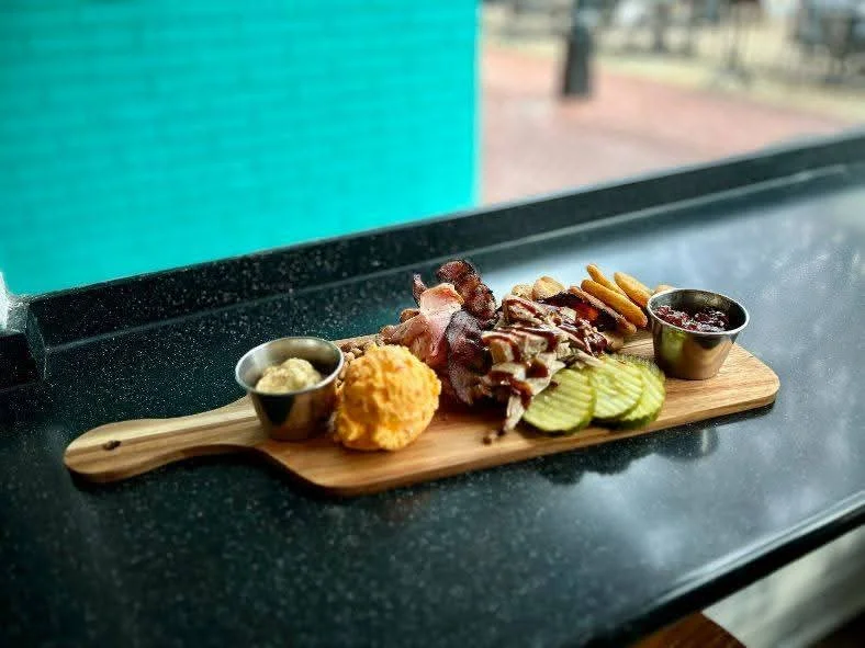 Southern BBQ platter with smoked meats and sides