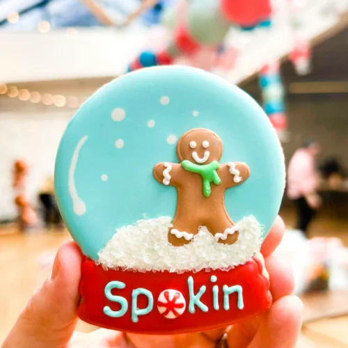 Festive gingerbread cookie in a snow globe design