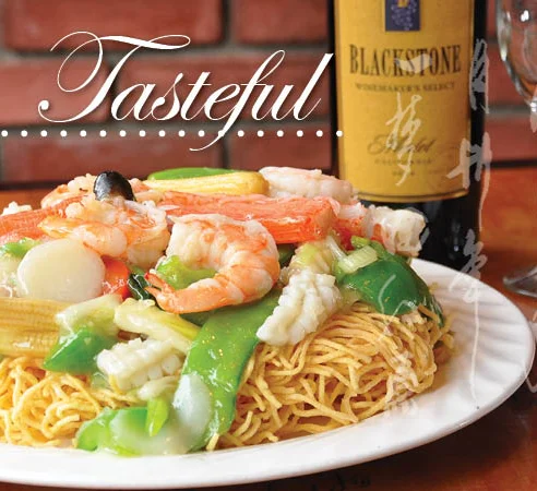 Chinese stir-fried noodles with seafood and vegetables