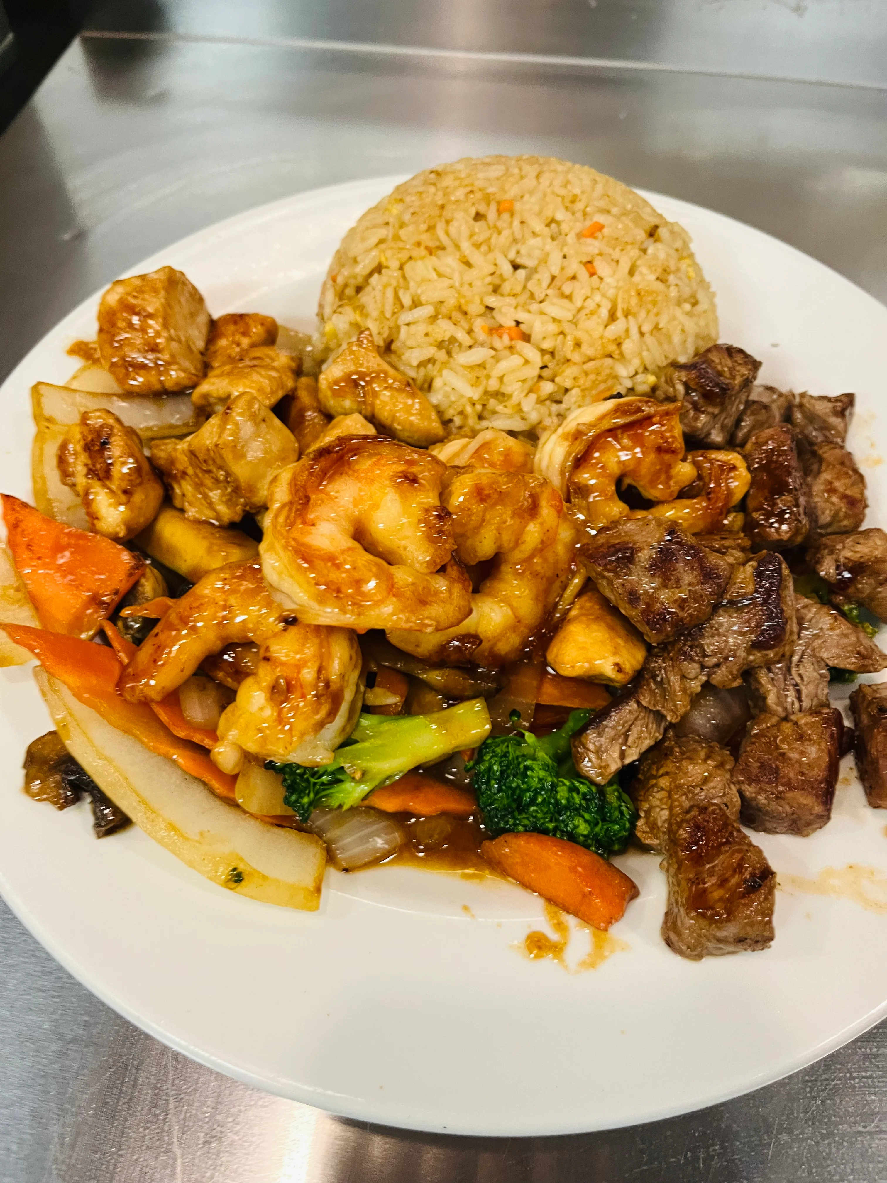 Delicious hibachi shrimp and steak with fried rice