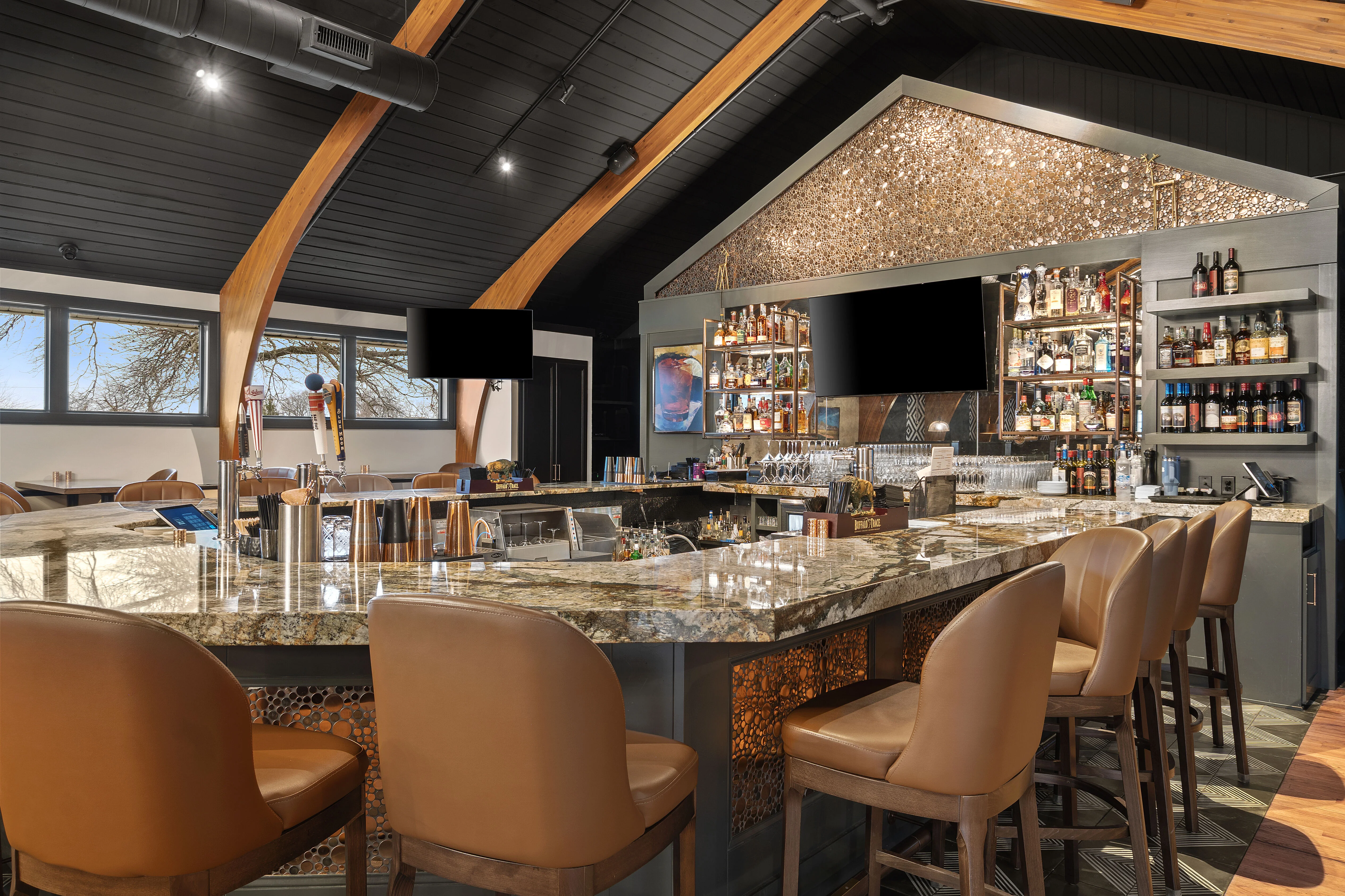 Modern bar interior with elegant design and seating