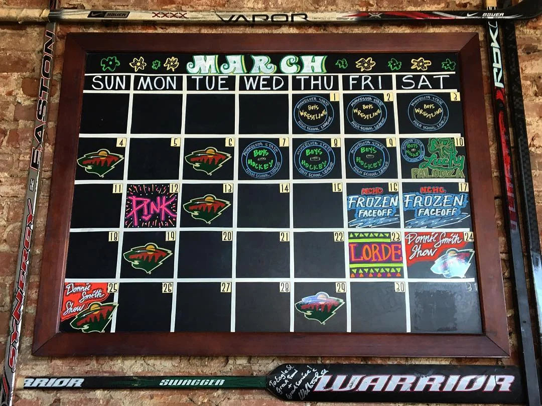 March events calendar in a rustic restaurant setting