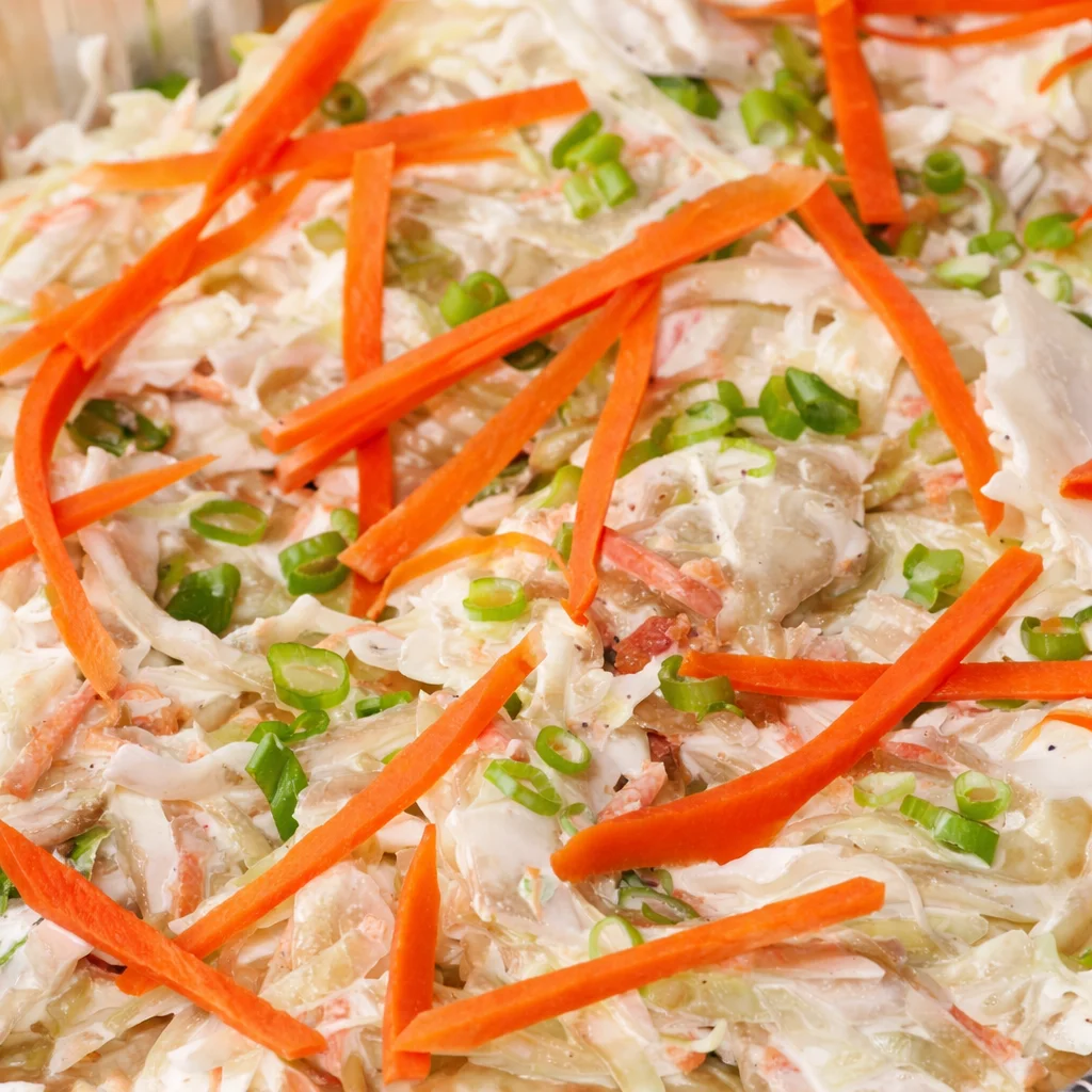 Creamy coleslaw with carrots and green onions