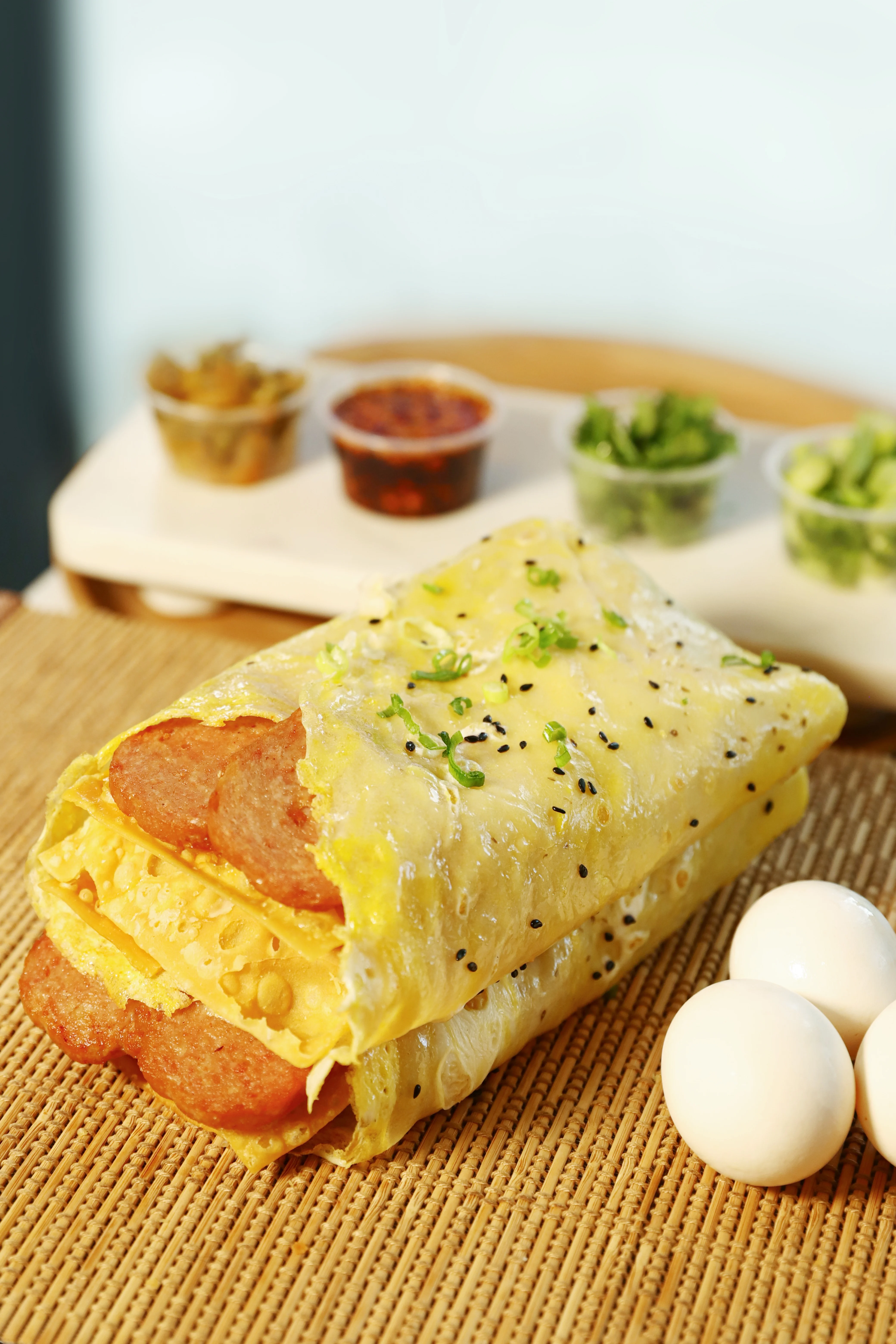 Savory Chinese egg pancake roll with sausage