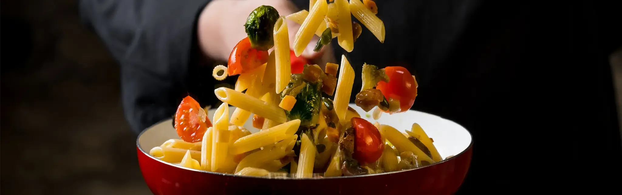 Penne pasta primavera with fresh vegetables