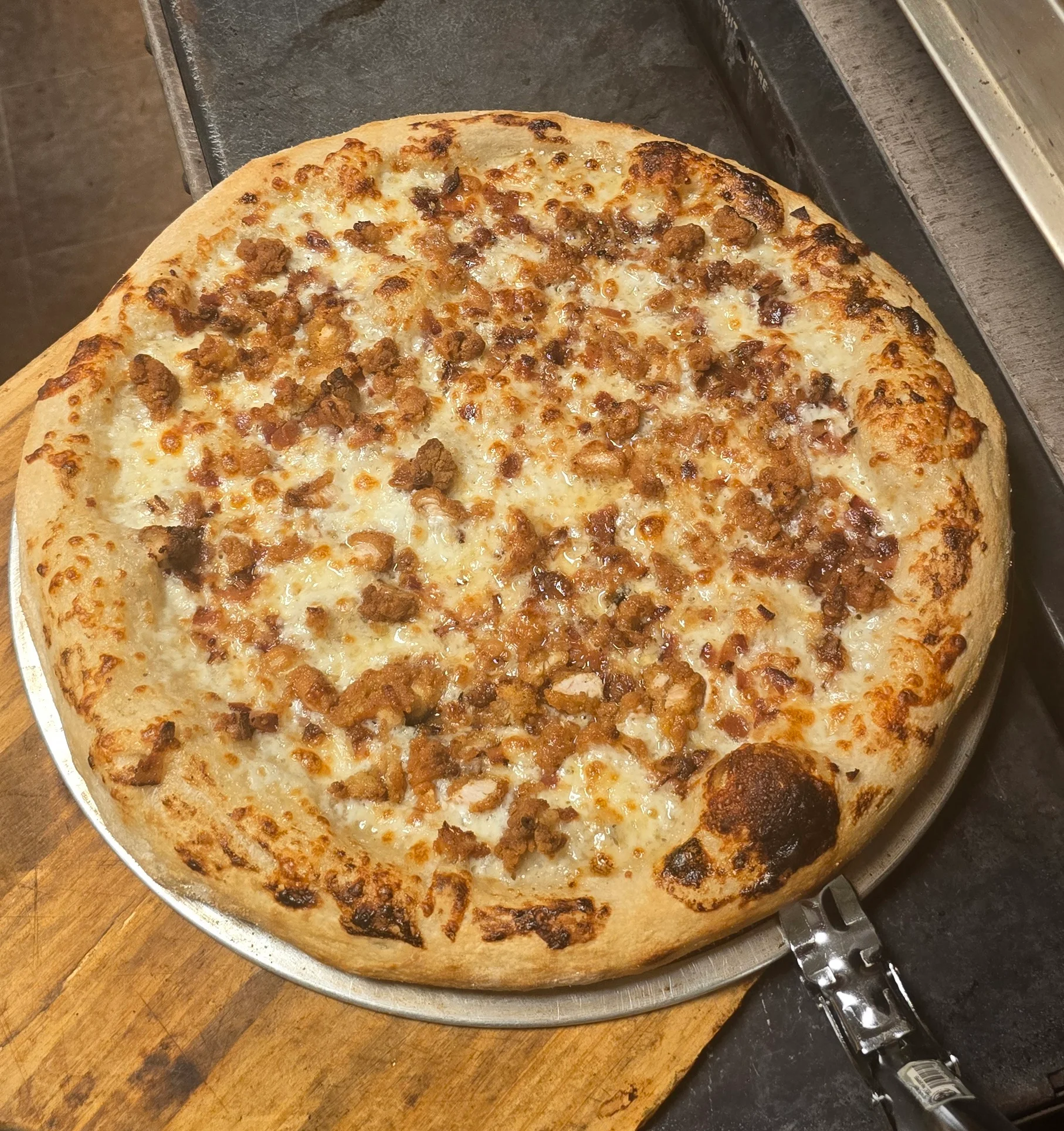 Savory sausage pizza with golden crust