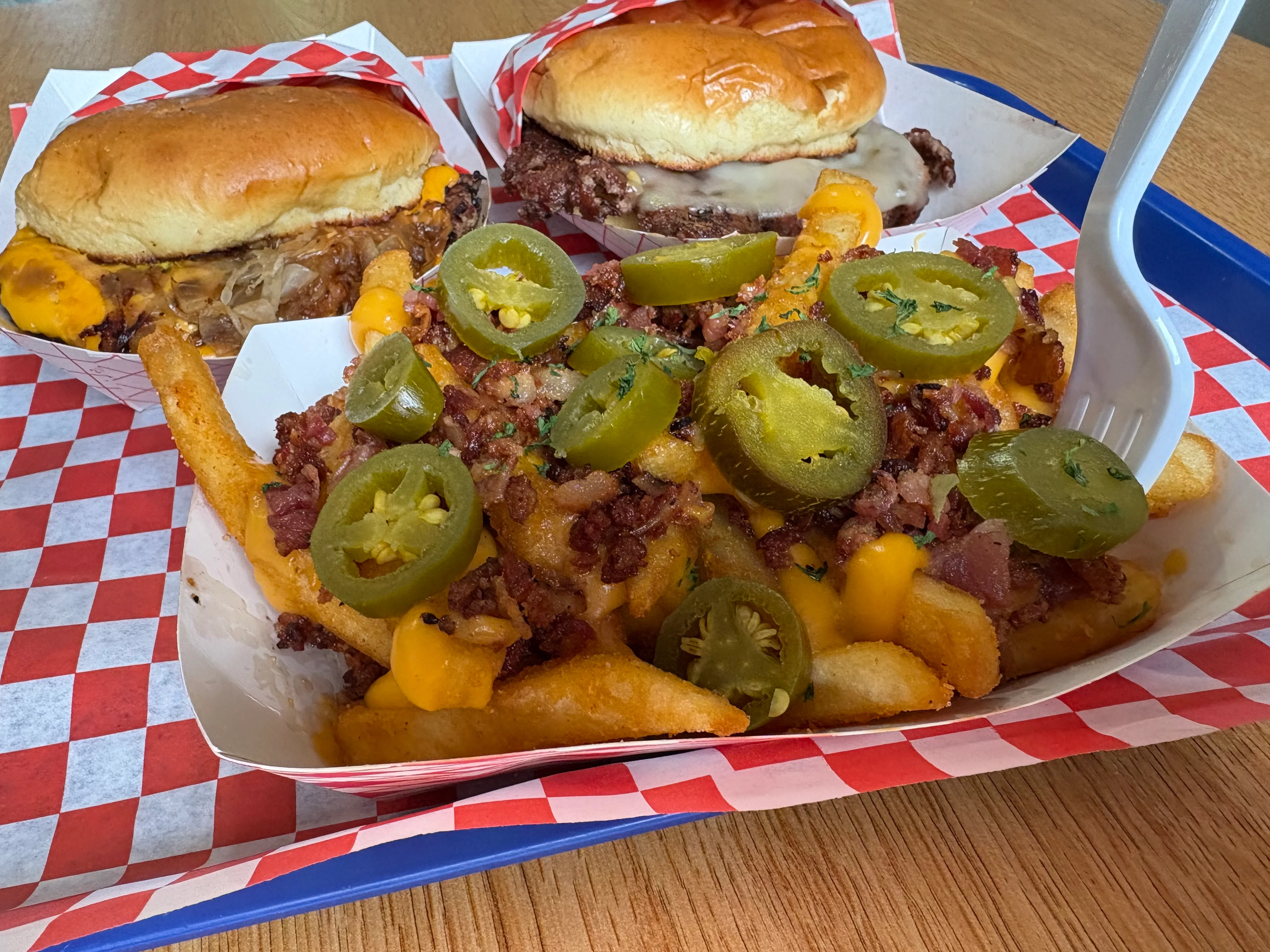 Loaded cheese fries with jalapeños and bacon